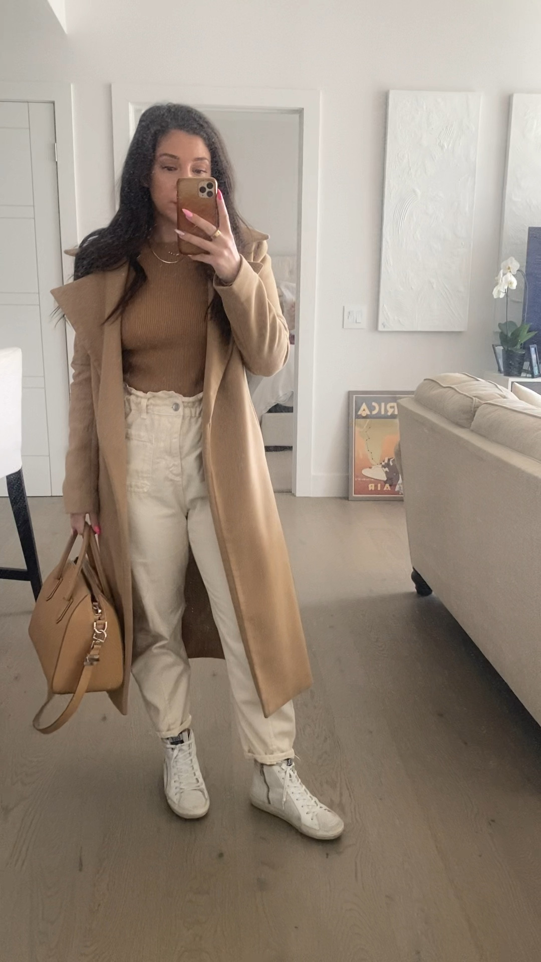 Camel and white tones are perfect for when it’s getting colder but you still want some bright hues for fall. I love a cream denim with light brown. These golden goose slides have been such a great investment for me. They look good with so many outfits. #Fallfashion 

#LTKHoliday #LTKstyletip #LTKSeasonal