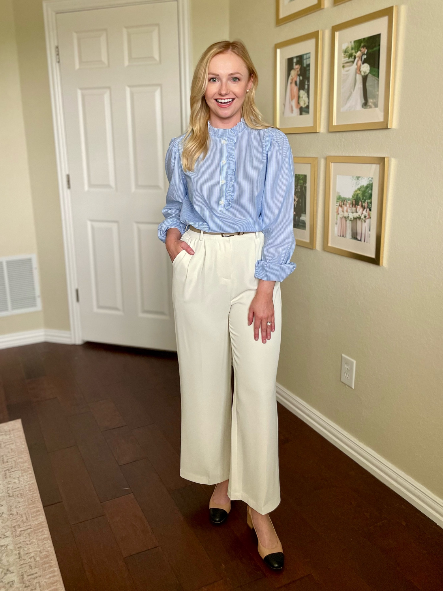 Blue and white stripe button up top with ruffle collar detail. Wearing an XS | workwear, work outfit, spring workwear, ruffle blouse, spring outfit, white work pants 

#LTKworkwear #LTKfindsunder50 #LTKstyletip