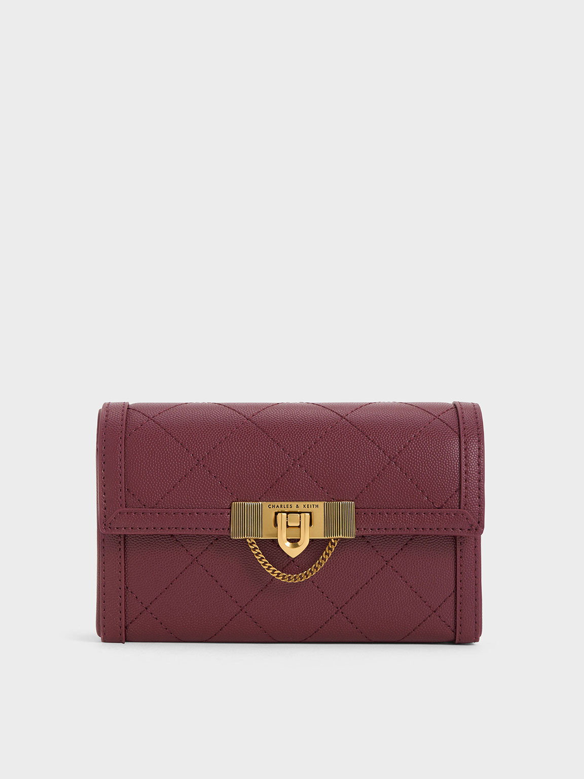 Burgundy Tallulah Quilted Push-Lock Clutch | CHARLES & KEITH | Charles & Keith US
