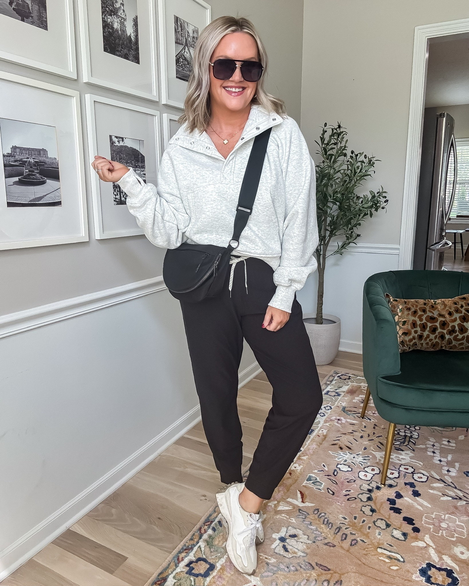 Comfy fall days call for an outfit like this 🤍 This cozy snap collar pullover has a relaxed fit that pairs perfectly with joggers, sneakers, and a crossbody for errands, travel, or running around all day.

snap collar pullover, black joggers, casual fall outfit, cozy sweatshirt, athleisure outfit, errand outfit, travel outfit, sneaker outfit, comfy fall style, everyday fall outfit, lovelylifestyling

#LTKootd #LTKSeasonal #LTKTravel