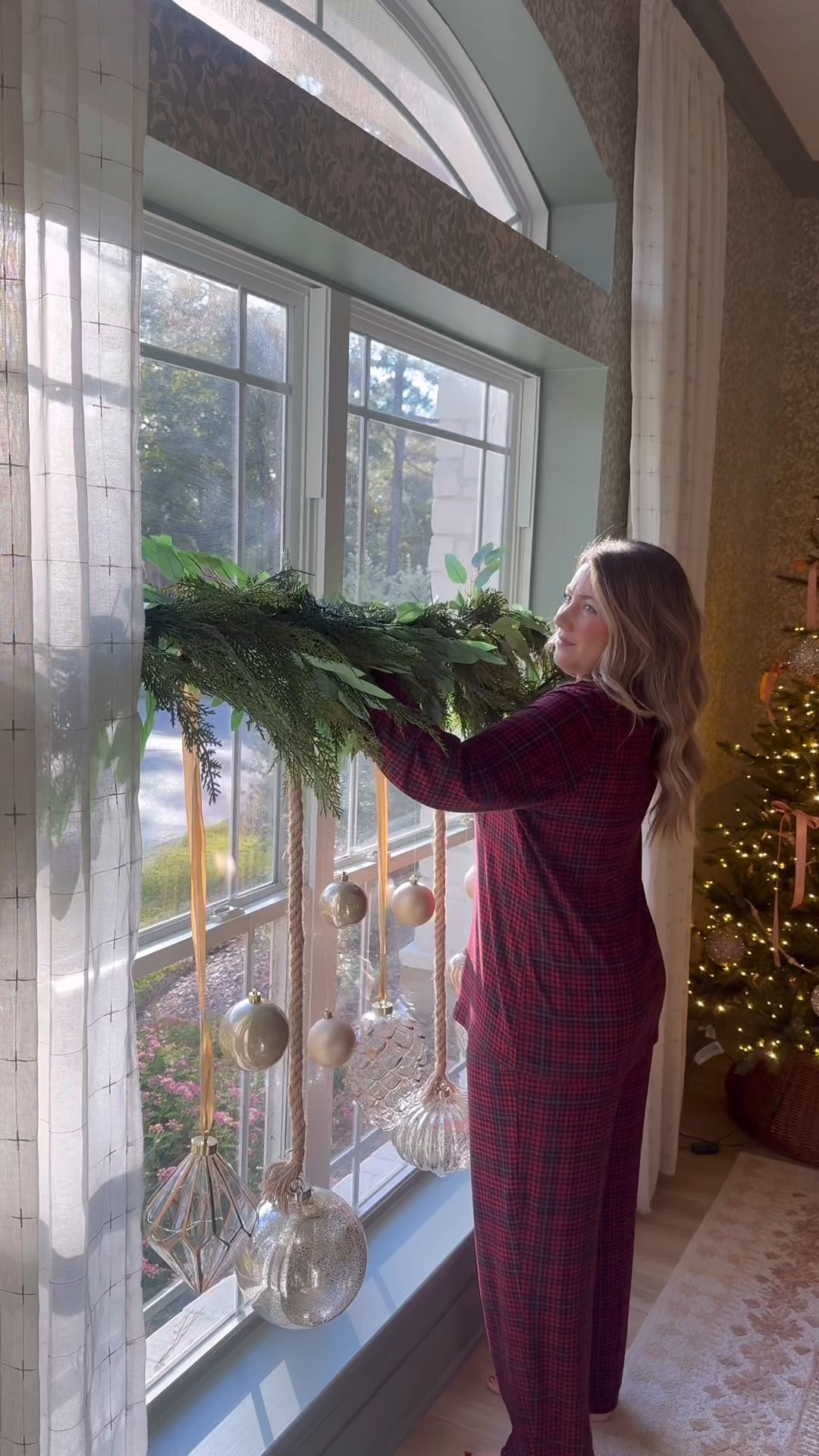 Wow wow wow!!! The only thing that could make this feel more magical is seeing snow out the window! ❄️ @shopinteriordelights has beautiful kits for doing the viral curtain rod hack! These sell out every year! You don’t have to put it in a door way, I love it hanging in our front window! They also have a more affordable shatterproof option! Both are selling out QUICK! Comment SHOP for links!!! They are currently having their biggest sale of the year and this kit is 20% off!! #ad #magesticensemble #interiordelights #shopinteriordelights 