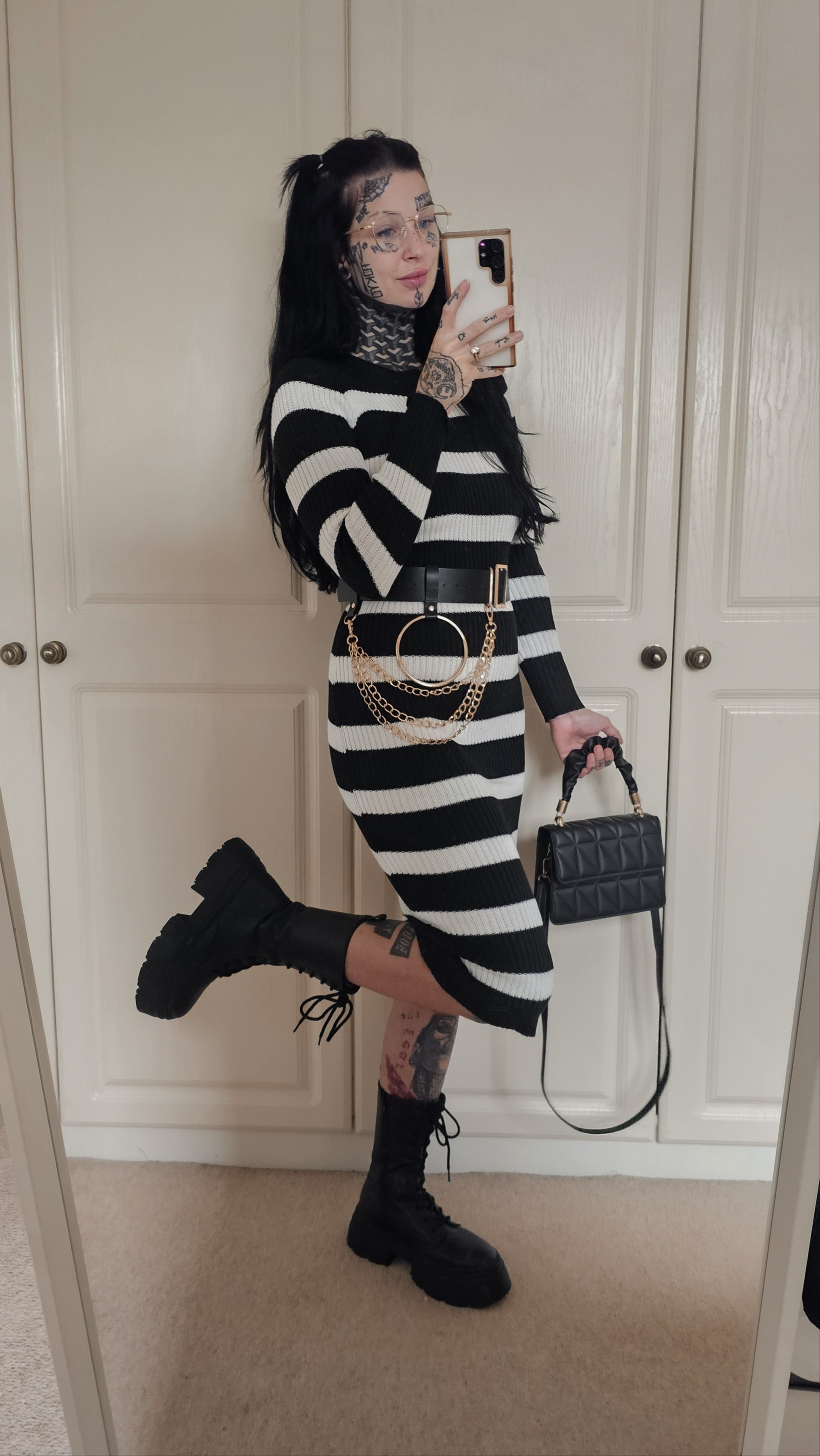 Horizontal stripe midi dressCasual alternative aesthetic Chunky leather beltChunky mid calf lace up boots

#LTKU #LTKfindsunder50 #LTKworkwear