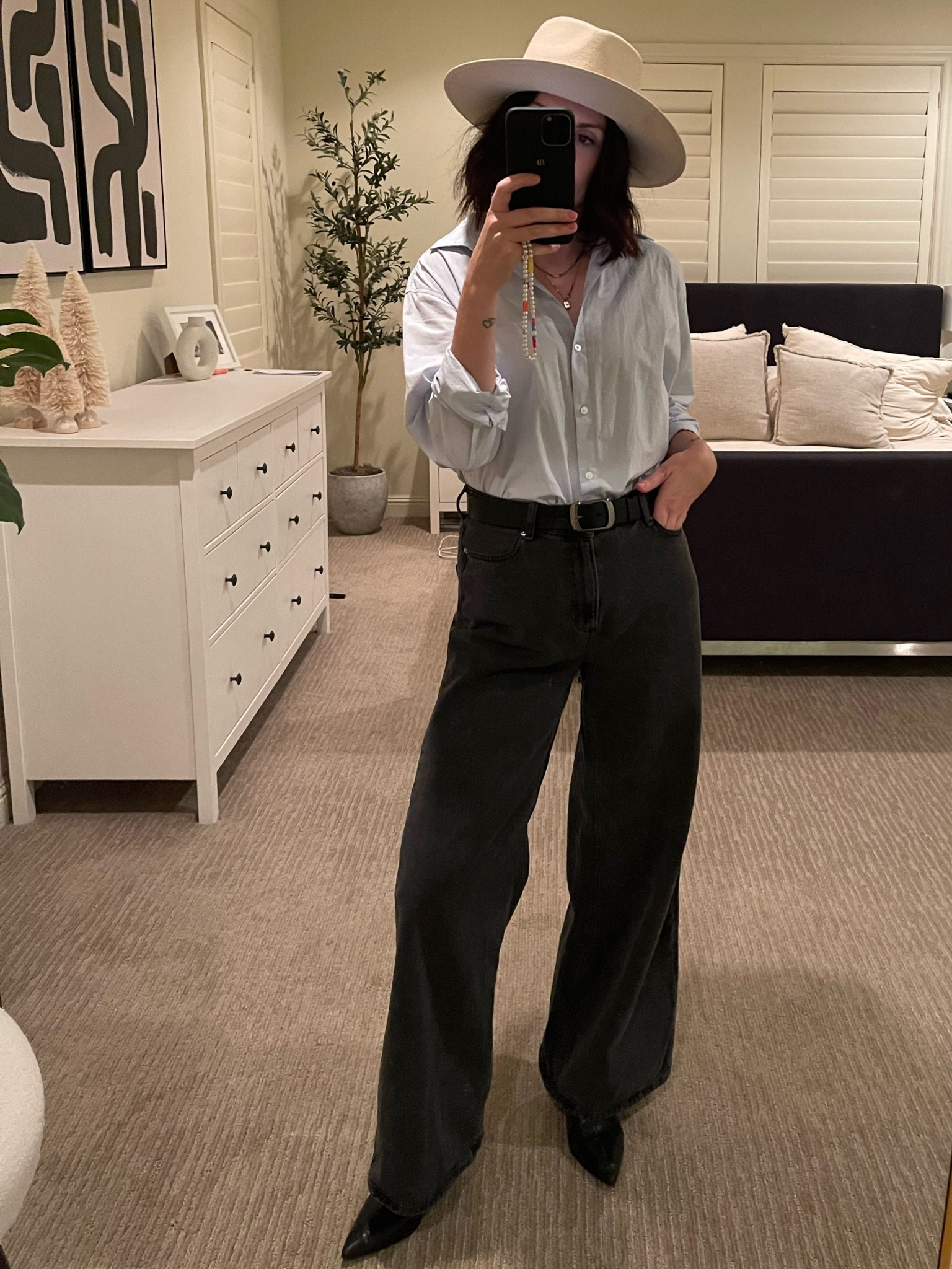 Blue button down, wide brim hat cream, wide legged grey jeans, black pointed heels, belt and gold accessories 

#LTKshoecrush #LTKSeasonal #LTKstyletip