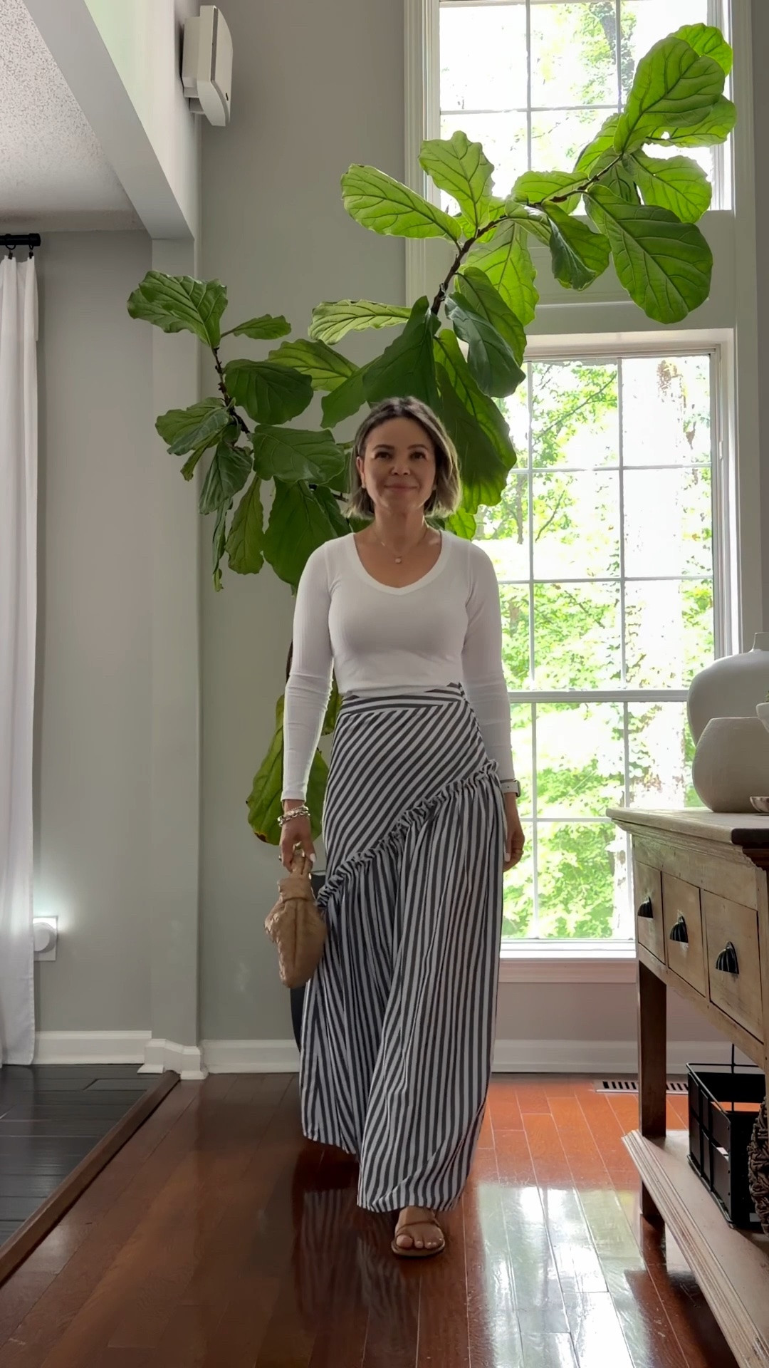 summer outfits
V neck white long sleeve top paired with this fun asymmetrical design skirt, in a grey and white stripe , nude flat sandals and bag.

#summer #outfit #strippedskirt #over50!

#LTKSeasonal #LTKOver40 #LTKPetite