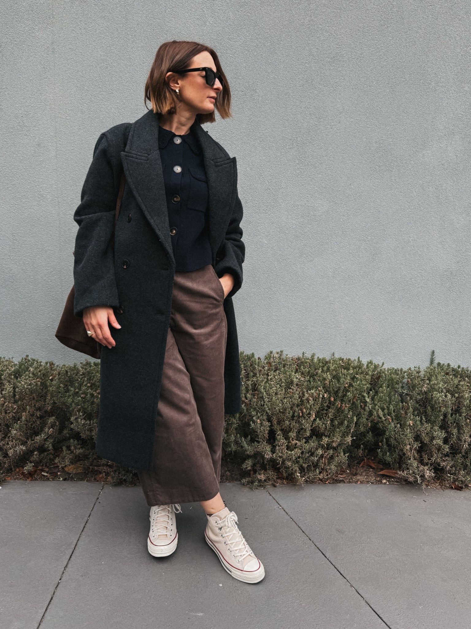 Pants - COS. Wearing my usual size 8 /36. 
Cardigan - Sezane wearing a small
Cami -Sezane. Wearing a small
Coat -Everlane. Wearing a small. Oversized fit 
Sneakers - Converse. Tts 

#LTKautumn #LTKnewzealand #LTKaustralia