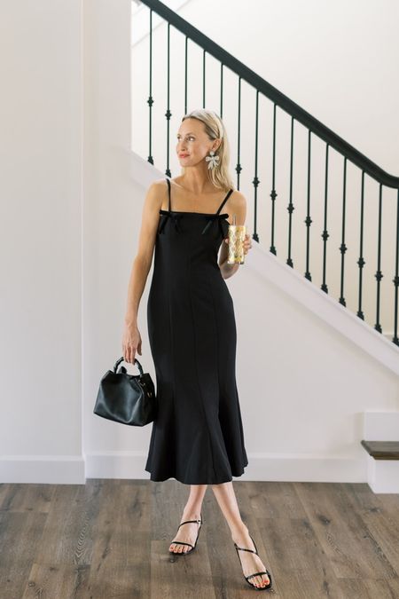 Love this bow clad holiday little black dress from Mestiza!   Bow earrings, Pearl headband and emme parsons shoes 

#LTKitbag #LTKstyletip #LTKHoliday