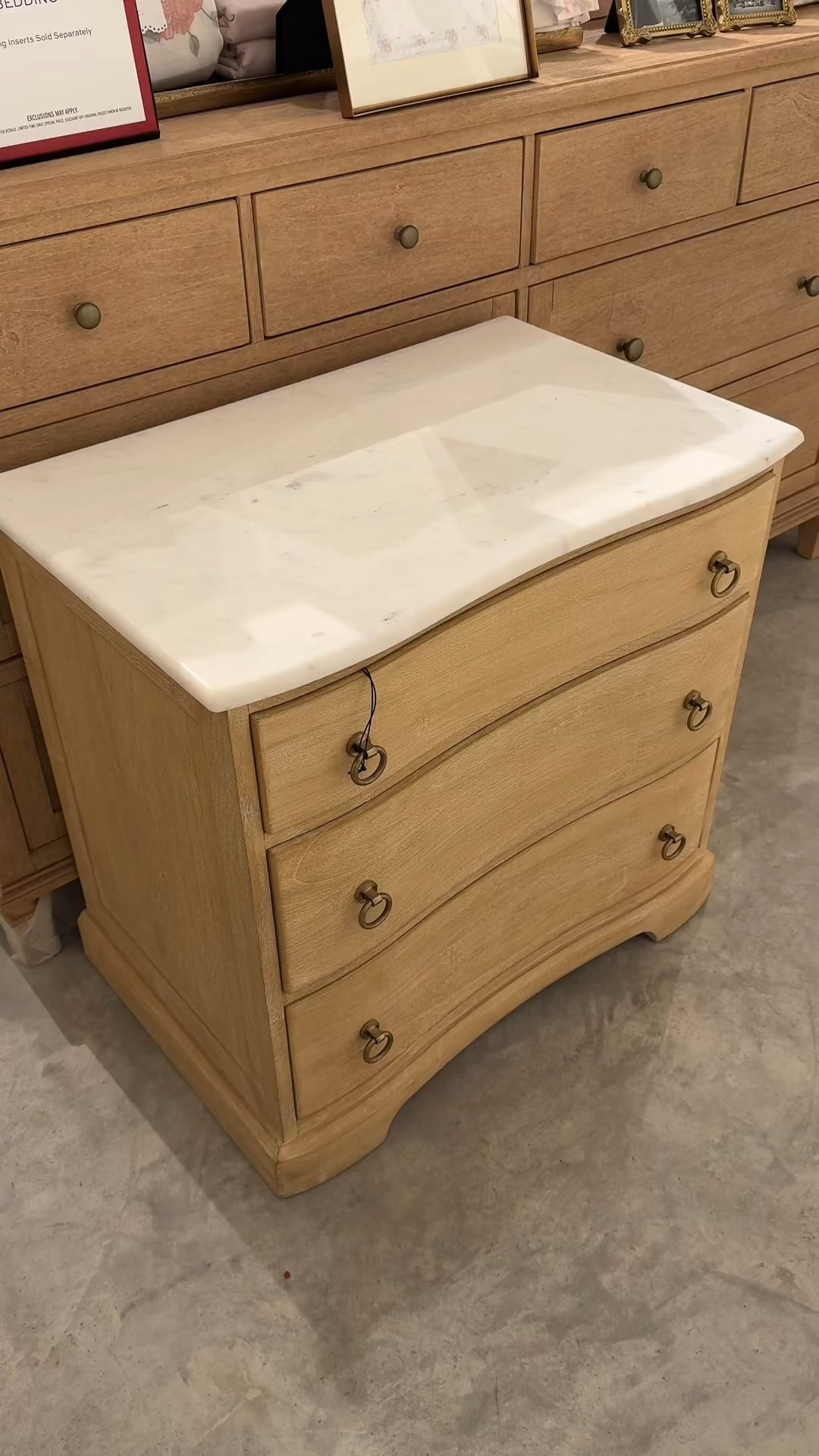 The Scarlett Marble Nightstand from Pottery Barn in Light Weathered Wheat is such a special find—soft, warm, almost blonde wood paired with a polished marble top for that understated luxe look. 🤍✨ The classic silhouette keeps it timeless, while the three roomy drawers (with smooth-glide hardware) make it as practical as it is beautiful. Linked a few other coordinating pieces and nightstands from this collection that work seamlessly together! ☺️ #PotteryBarn #Nightstand #BedroomFurniture

#LTKHome #LTKGiftGuide #LTKSaleAlert