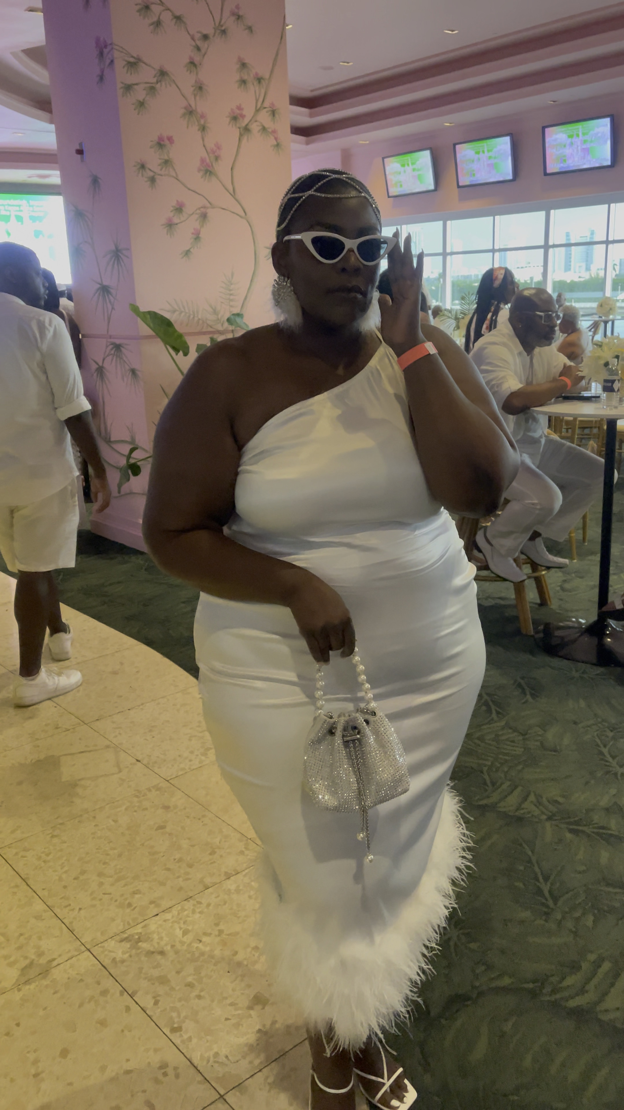 This satin feather trimmed dress is giving classy and chic. Perfect for an all white party or elegant event. Shop the look or similar 

#LTKunder100 #LTKcurves #LTKFind