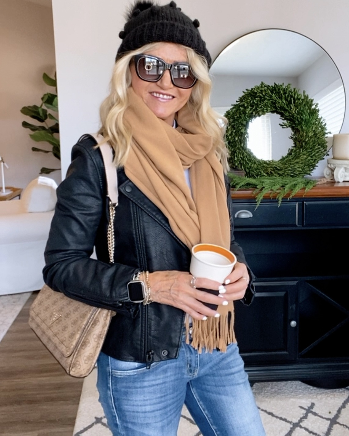Effortless cool vibes 🖤 Style your black moto jacket with a cozy brown scarf, lug boots, a classic white tee, and the perfect accessories: black beanie, sunnies, and a chic tan bag. 🔥 Casual, edgy, and ready for anything. #StreetStyle #MotoJacketLook #WinterOutfitInspo

#LTKStyleTip #LTKFindsUnder100 #LTKGiftGuide