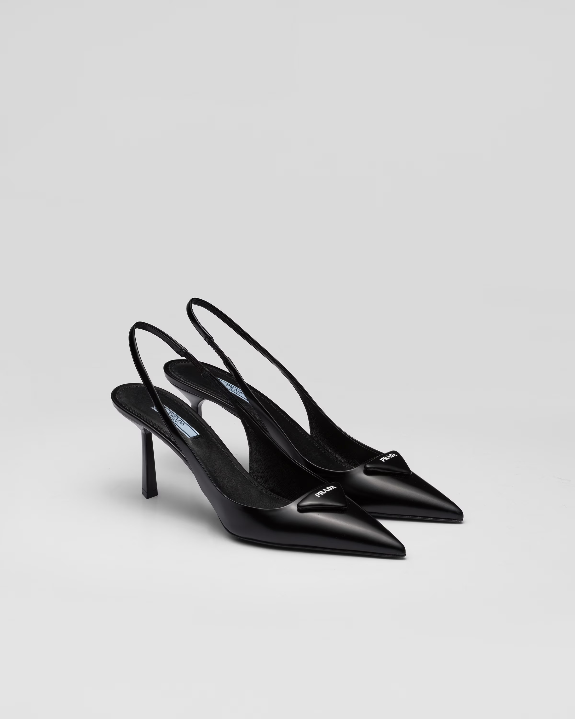 Brushed leather slingback pumps | Prada Spa US