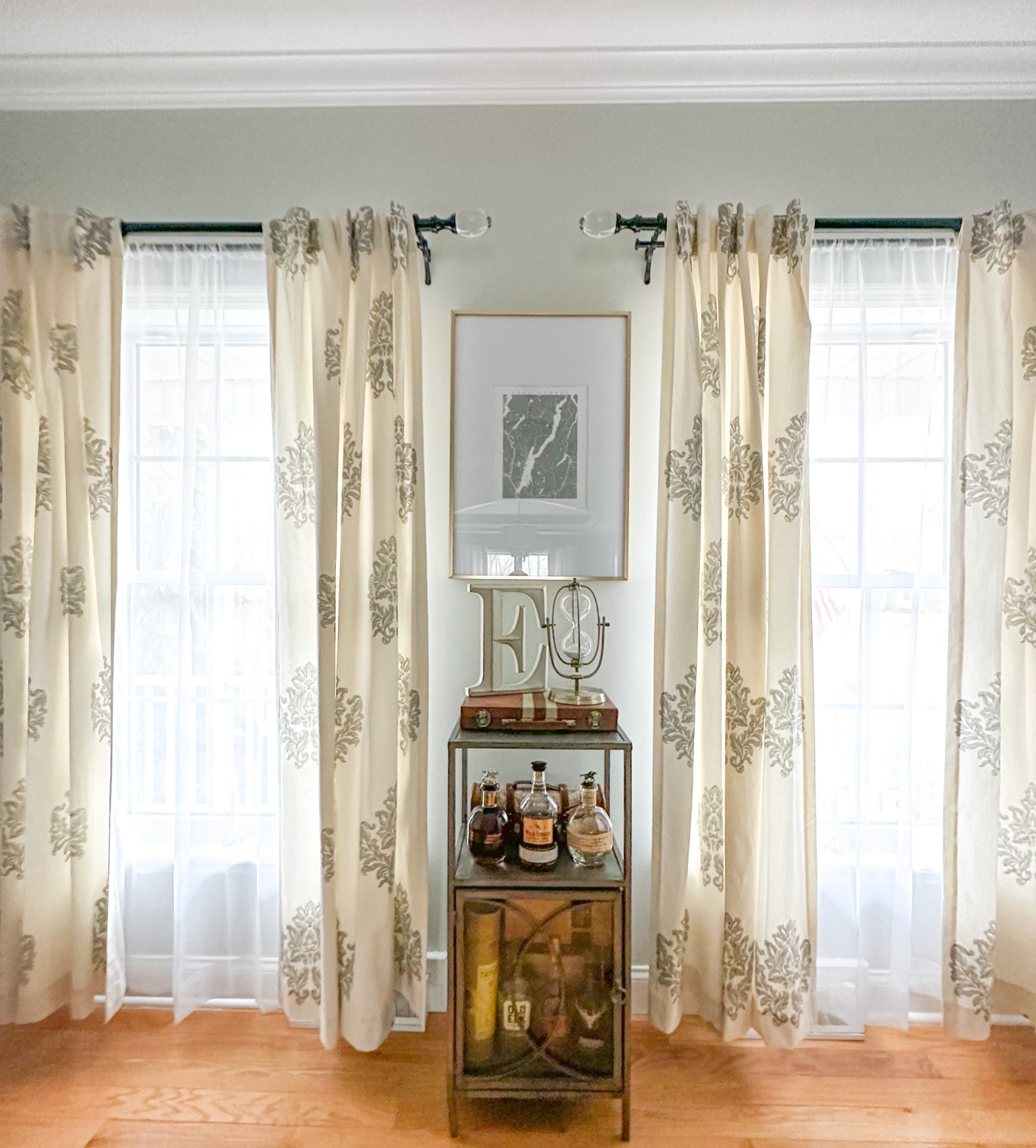 Home decor 
Curtains: Ballard Design 
Curtain hardware: Pottery Barn
Oversized matted frame: West Elm 
Display cabinet: West Elm 

#LTKFind #LTKhome #LTKsalealert