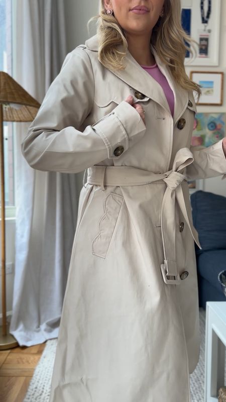 Scalloped trench coat with tortoise buttons and an adjustable tie. In the size XS which is slightly big on me. If you want this fit go true to size but if you want it more fitted then go down one size. 🤍 #trenchcoat #springcoat #scalloped #scallops #KateSpade #springcoats 

#LTKSeasonal #LTKsalealert #LTKstyletip