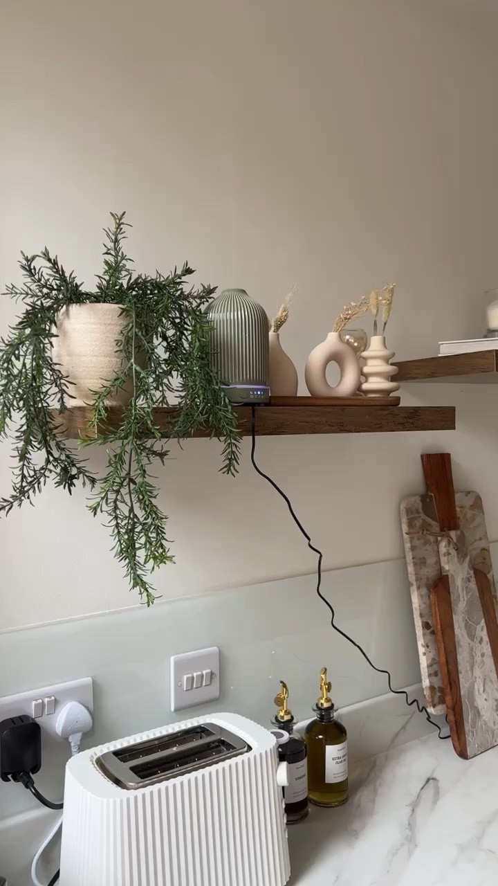 my kitchen set up 🫶🏽

- shelves are from B&M (code 397406)
- the oval board that the vases are on is the large size from the link below 
