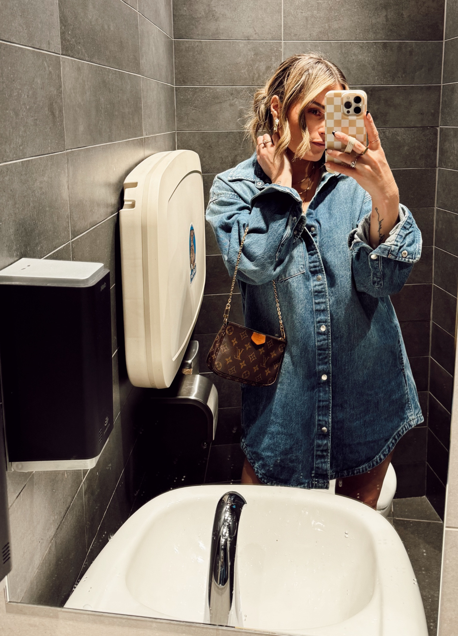 Aritzia Maya Denim Dress - fits TTS in an oversized fit. I’m in the M. Comes in two washes. It’s a thicker denim, so it can dual as a jacket or button down shirt. Obsessed!