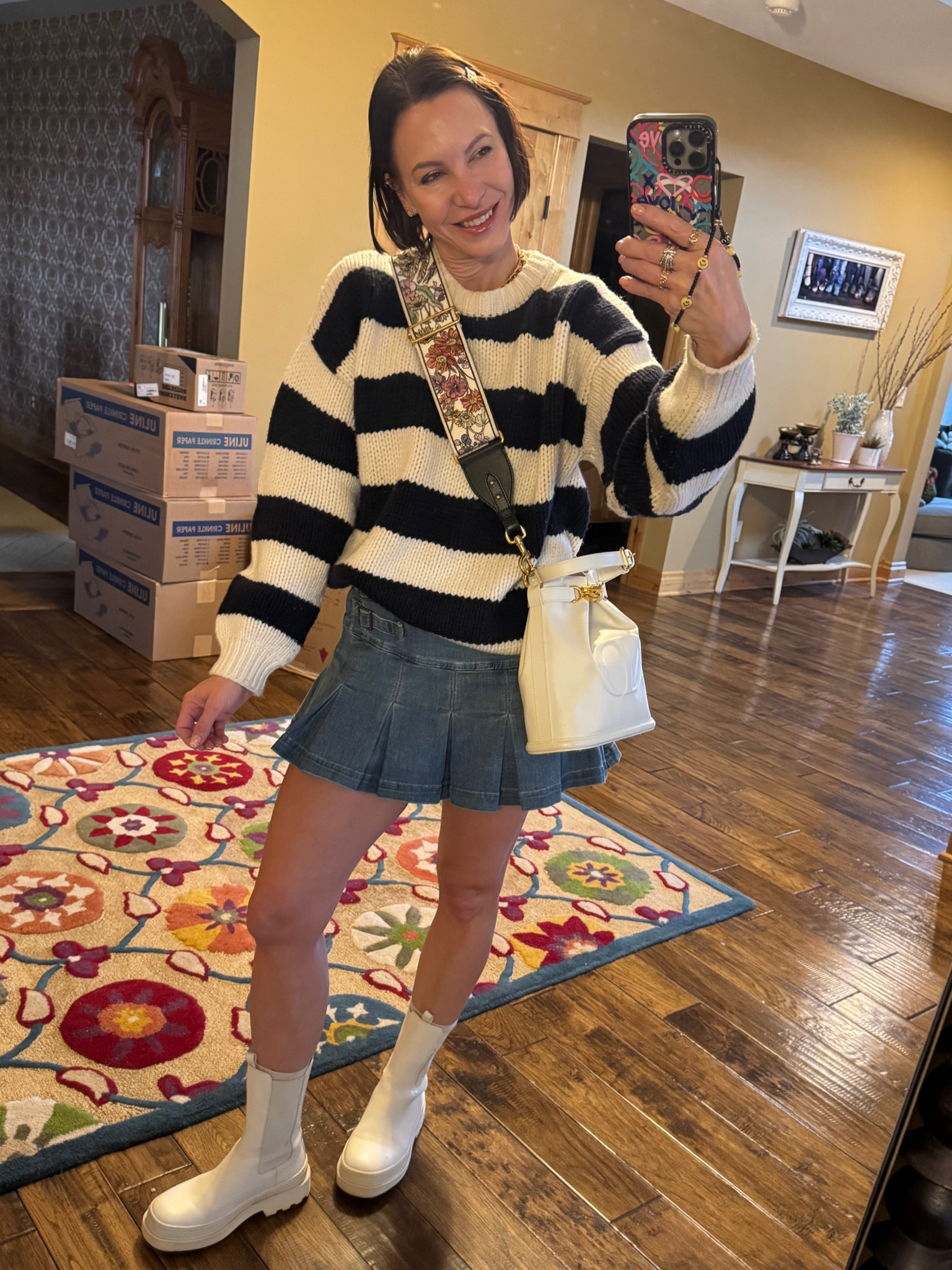 Fall outfit look for the day. Love pairing a denim skirt with boots and a sweater. Topped off with a Dior cross body bag & Dior floral strap (sold separate). 

Target skirt
Dior boots, bag, and necklace 
Frame sweater (Nordstrom and old)

#LTKSeasonal #LTKStyleTip #LTKItBag