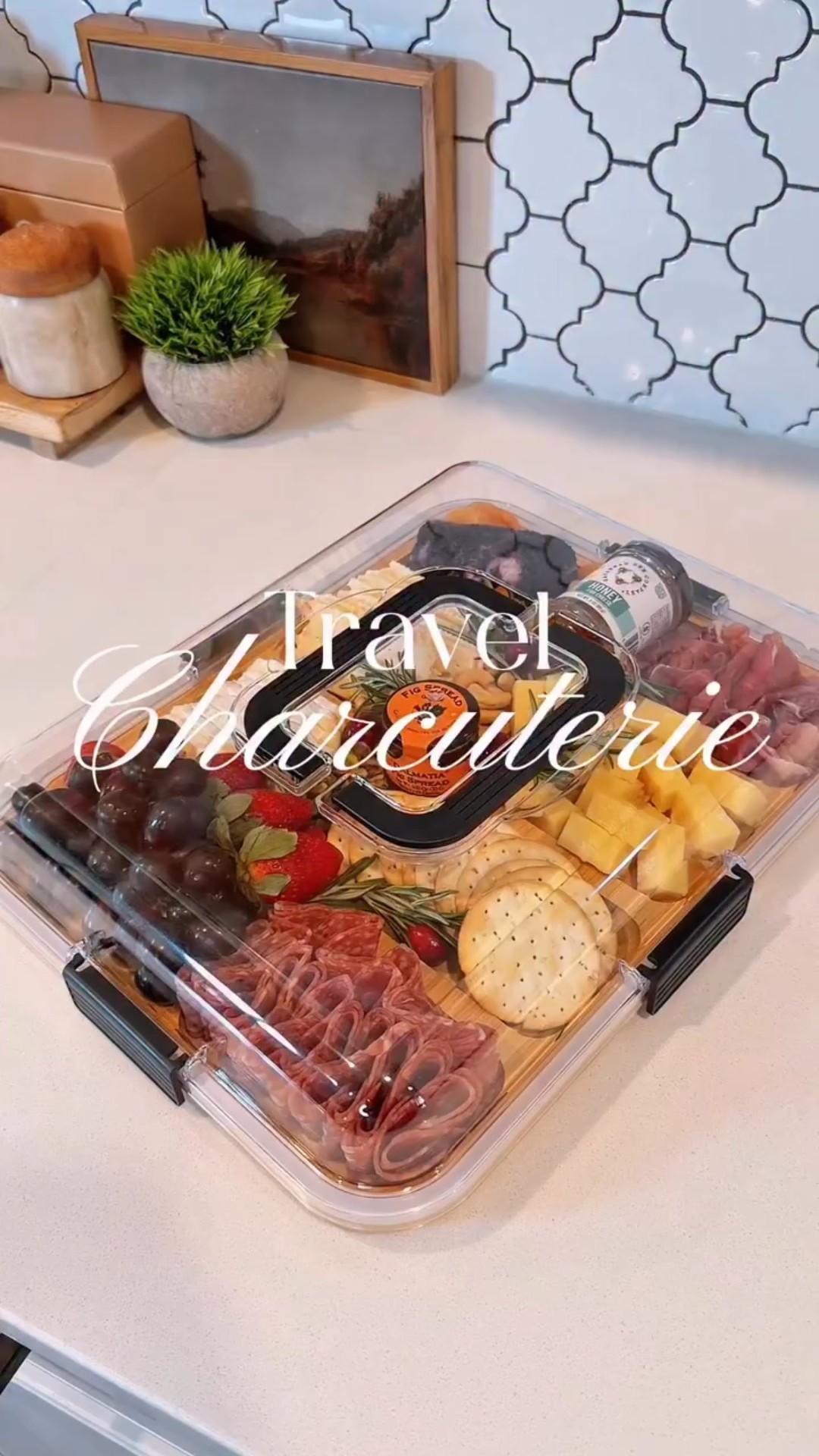 🎀 Follow + Comment “TRAVEL” and I’ll send you the link to this travel board.

✨ This to go charcuterie board tray was made for taking snacks to go. Eight sections, the bamboo base is sturdy, and the clear locking lid lets me prep ahead, store it in the fridge, then grab and go. Nothing shifts, nothing spills. Shackle box.

Perfect for games, road trips, potlucks, park days, beach days, holidays, and year-round travel.
#amazonfinds #amazonmusthave #amazonhome #snacklebox #amazontravelessentials snackprep travelfriendly momlifehacks kitchenfinds amazonhomefinds amazonkitchen @spaceaid_official @amazonhome

#LTKfoodie #LTKmomlife #LTKHome