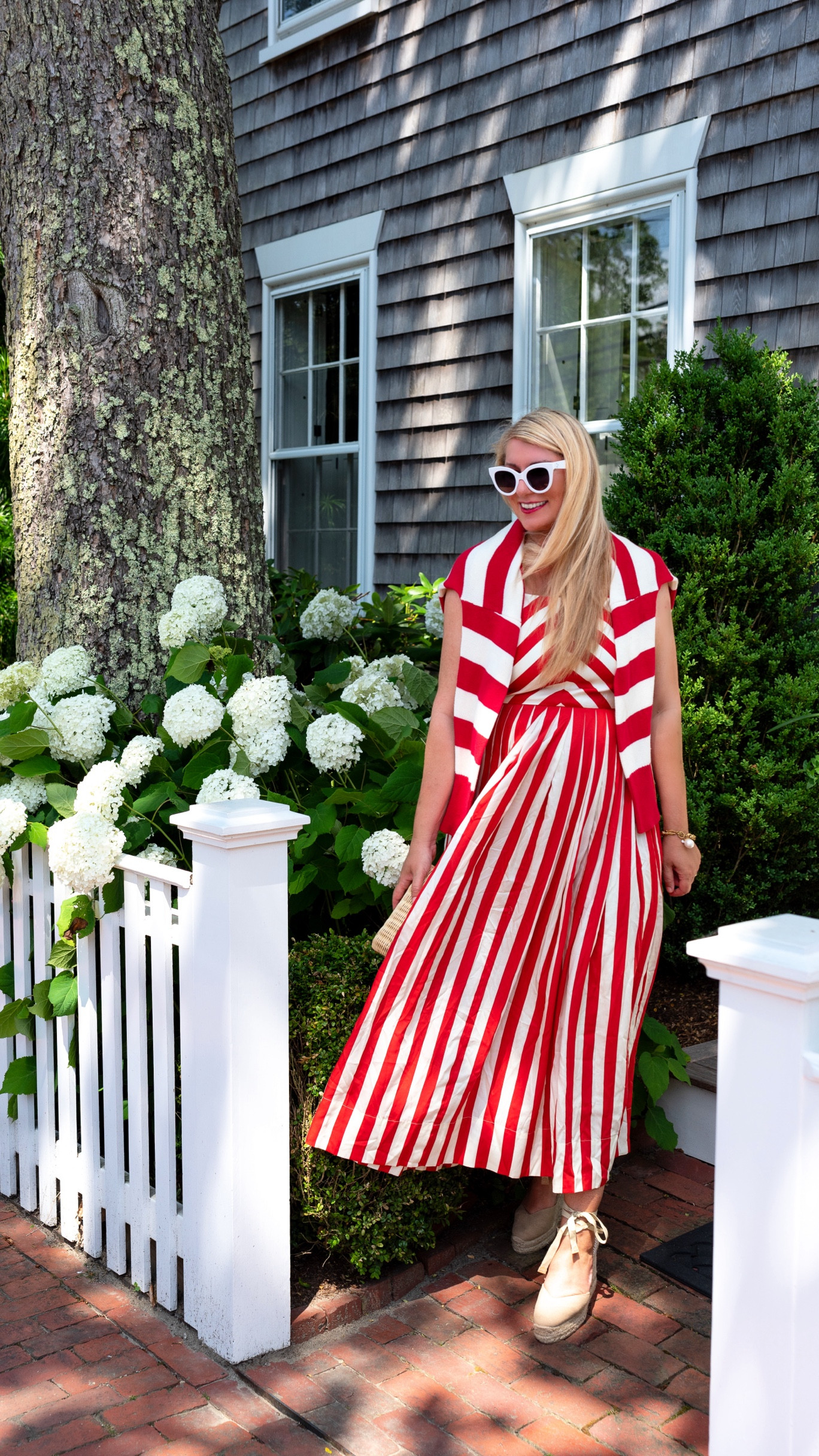 One of my favorite dinner outfits while on Nantucket ❤️ always love red & white stripes the most. Summer dress is fitted on top and has a zipper on the back. The tank straps are adjustable. Lined and very well made. The fabric is lovely. Paired with espadrilles and a sweater on the shoulders for breezy nights. 

#LTKOver40 #LTKMidsize #LTKSeasonal