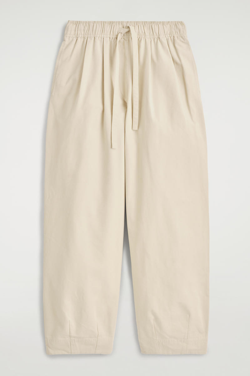 Cotton Tapered Drawstring Trousers in Light Beige | COS UK