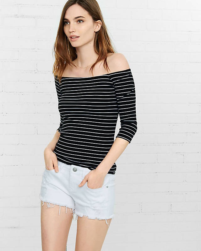 white low rise frayed denim cutoff shorts | Express