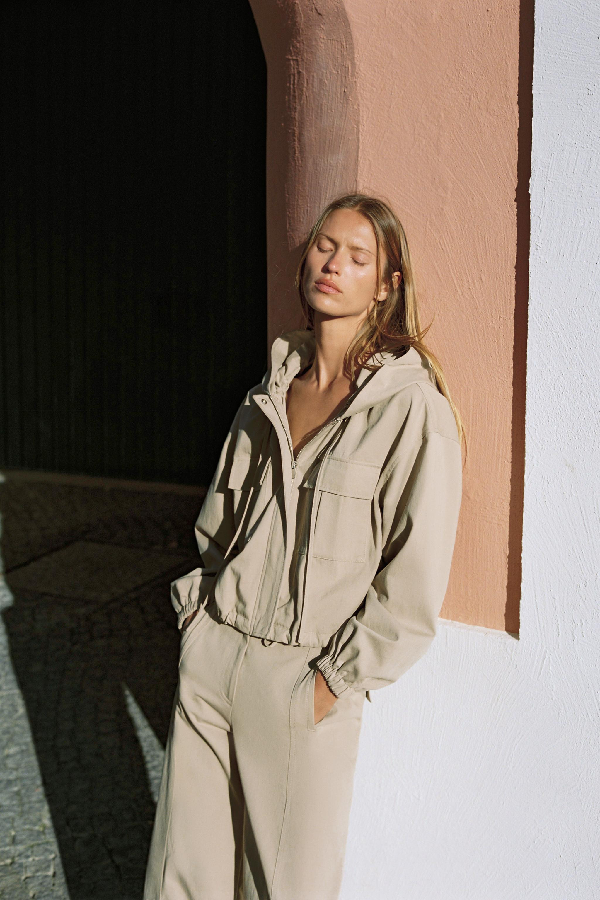 Jacket with an adjustable drawstring hood and long sleeves with elastic cuffs. Front patch pocket... | Zara UK