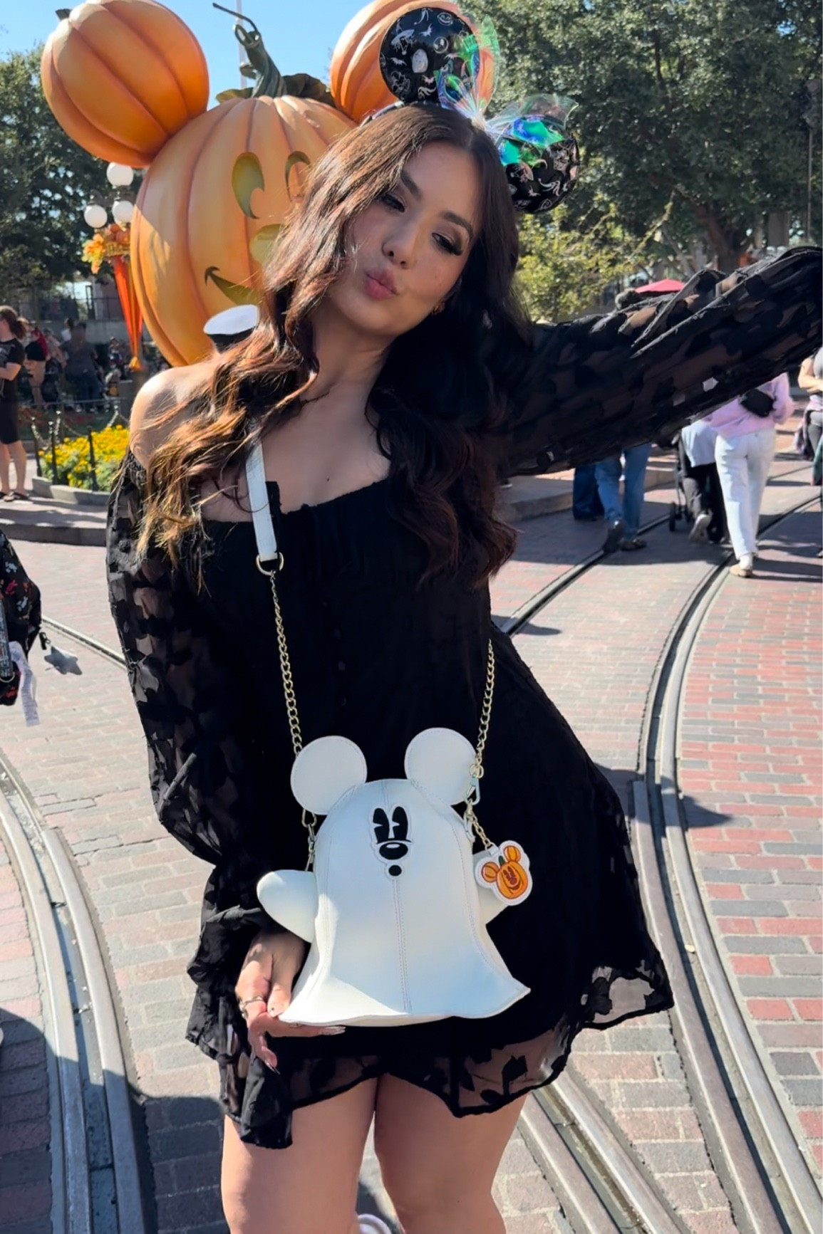 Halloween OOTD 👻🖤 
Dress size: Small 
The dress is sold out but linked similar ones. Both bag and ears are from loungefly. 