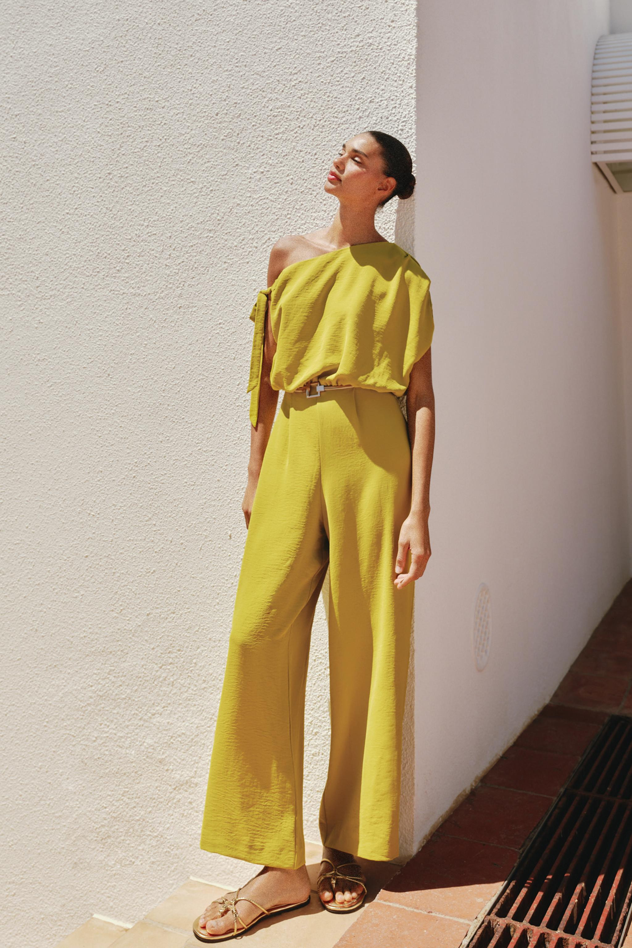ASYMMETRIC SLEEVE BELTED JUMPSUIT | Zara US