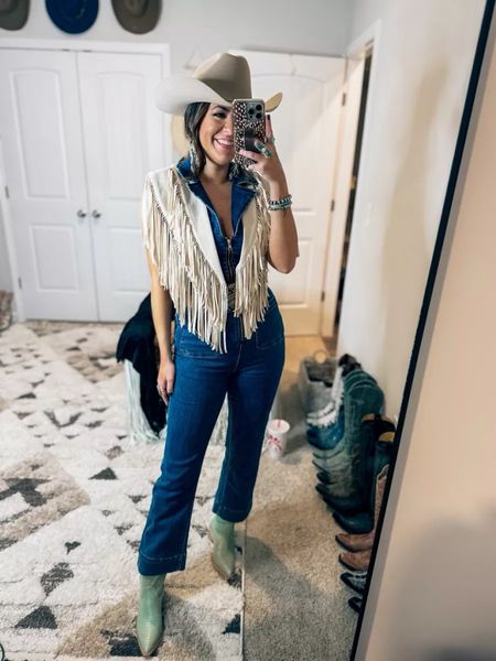 Love this fringe vest over this denim jumpsuit look! Add a cowboy add and cowgirl boots for a western chic flair! Follow for more western outfits, Nashville outfits, country concert outfits, rodeo outfits, and more!
3/29

#LTKparties #LTKstyletip #LTKSeasonal