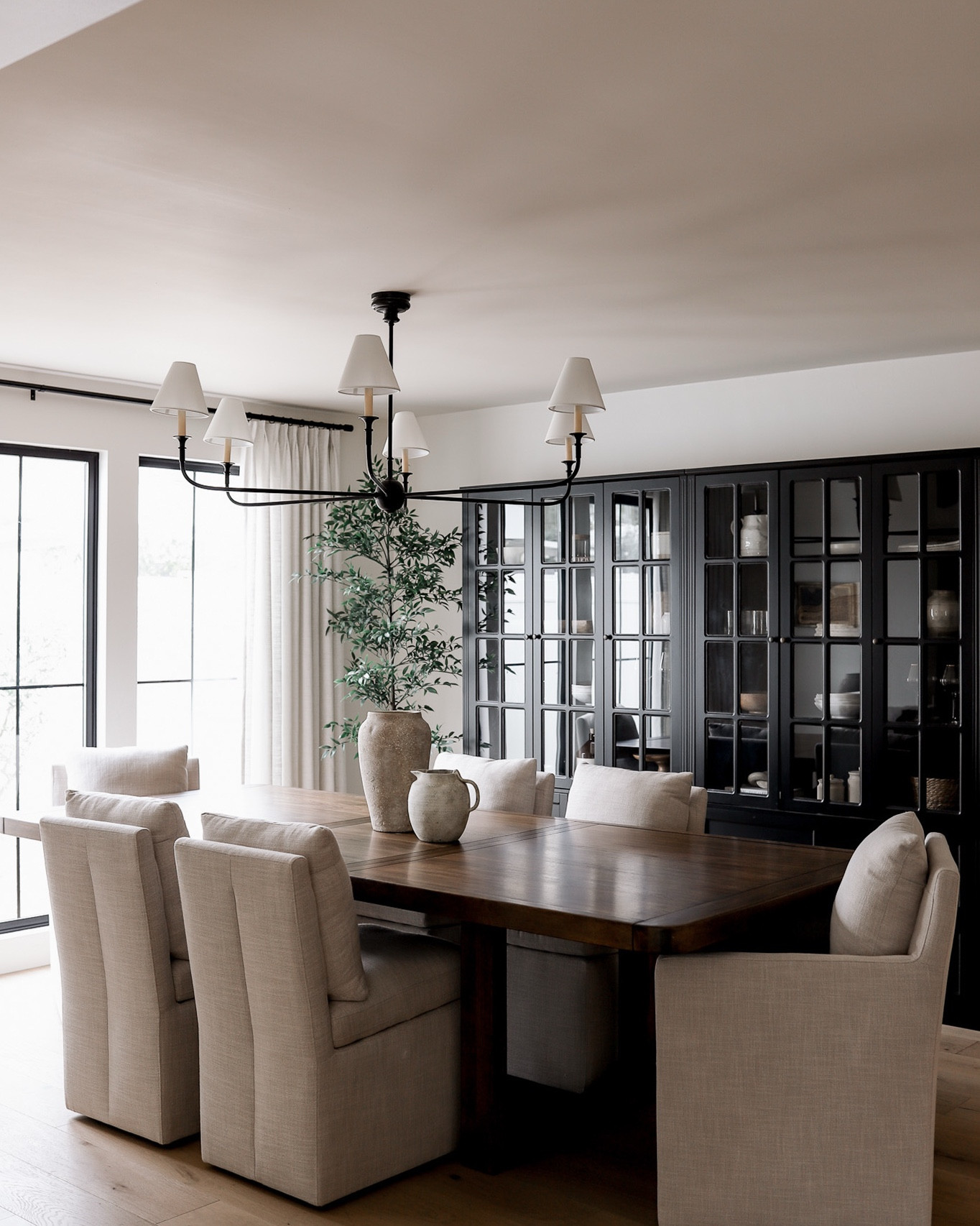 A moment for this dining table and chair combo. Loving the dark wood and linen - a perfect pair! ☺️ Shop our dining table and rolling dining chairs at the links below! 

#LTKSaleAlert #LTKHome #LTKSeasonal