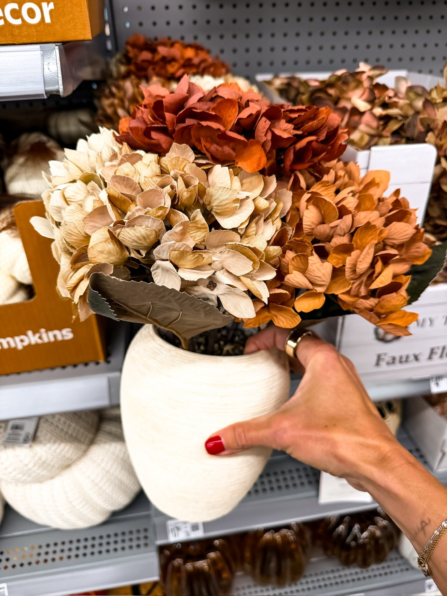 A faux fall floral arrangement is such an easy way to bring in seasonal color without having to constantly replace fresh stems. I love mixing warm rust, deep brown and muted greenery for a fuller arrangement that works on a dining table, console or kitchen counter all season.

faux fall florals, fall floral arrangement, artificial flowers, fall centerpiece, autumn decor, seasonal home decor, fall home, faux stems, table decor, fall decorating, TheMomInStyle

#LTKOver40 #LTKSeasonal #LTKHome