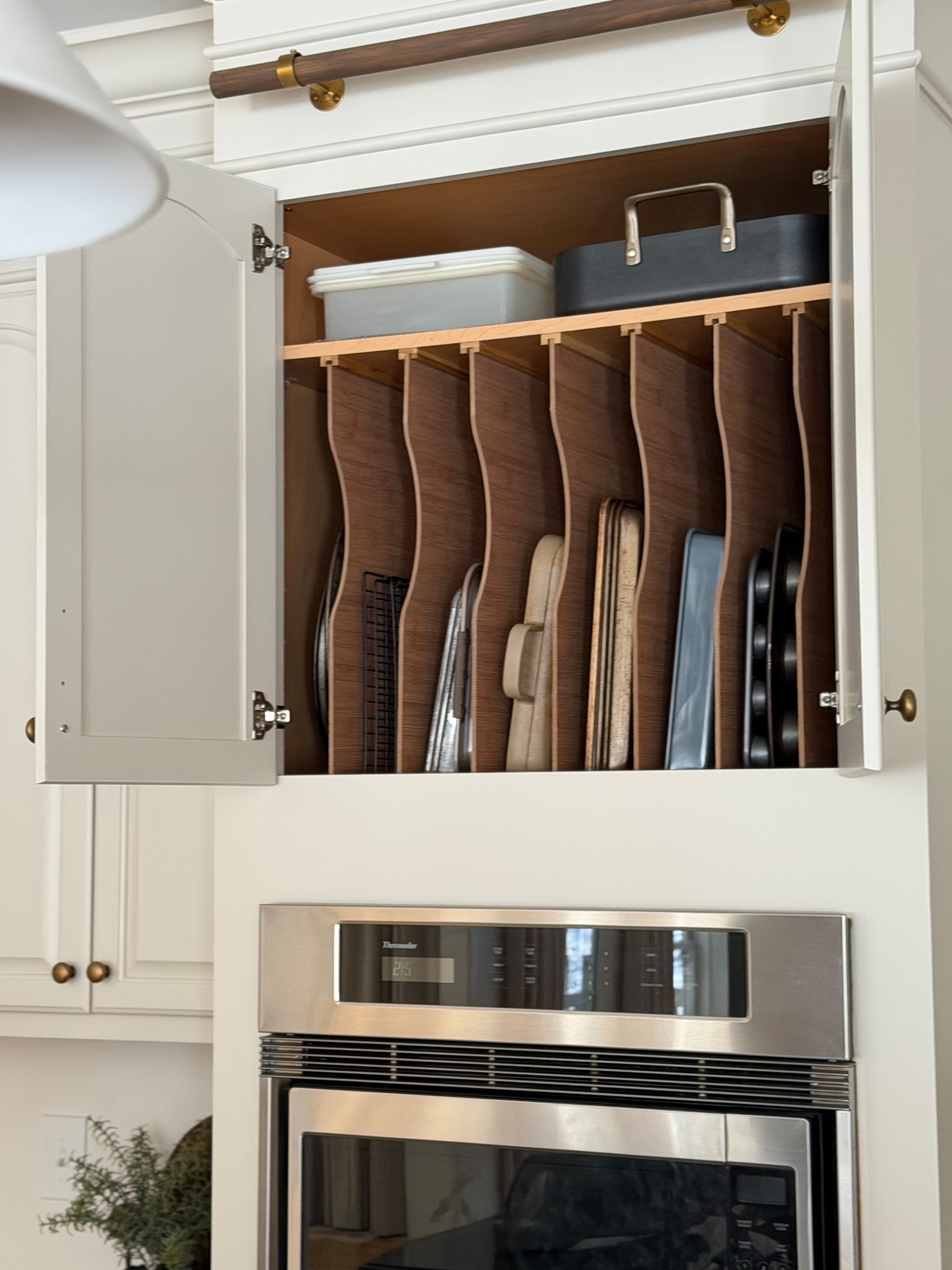 Cabinet organization upgrade! This easy to put together kit makes storing cookie sheets so much better!

#LTKSaleAlert #LTKHome #LTKdayinmylife