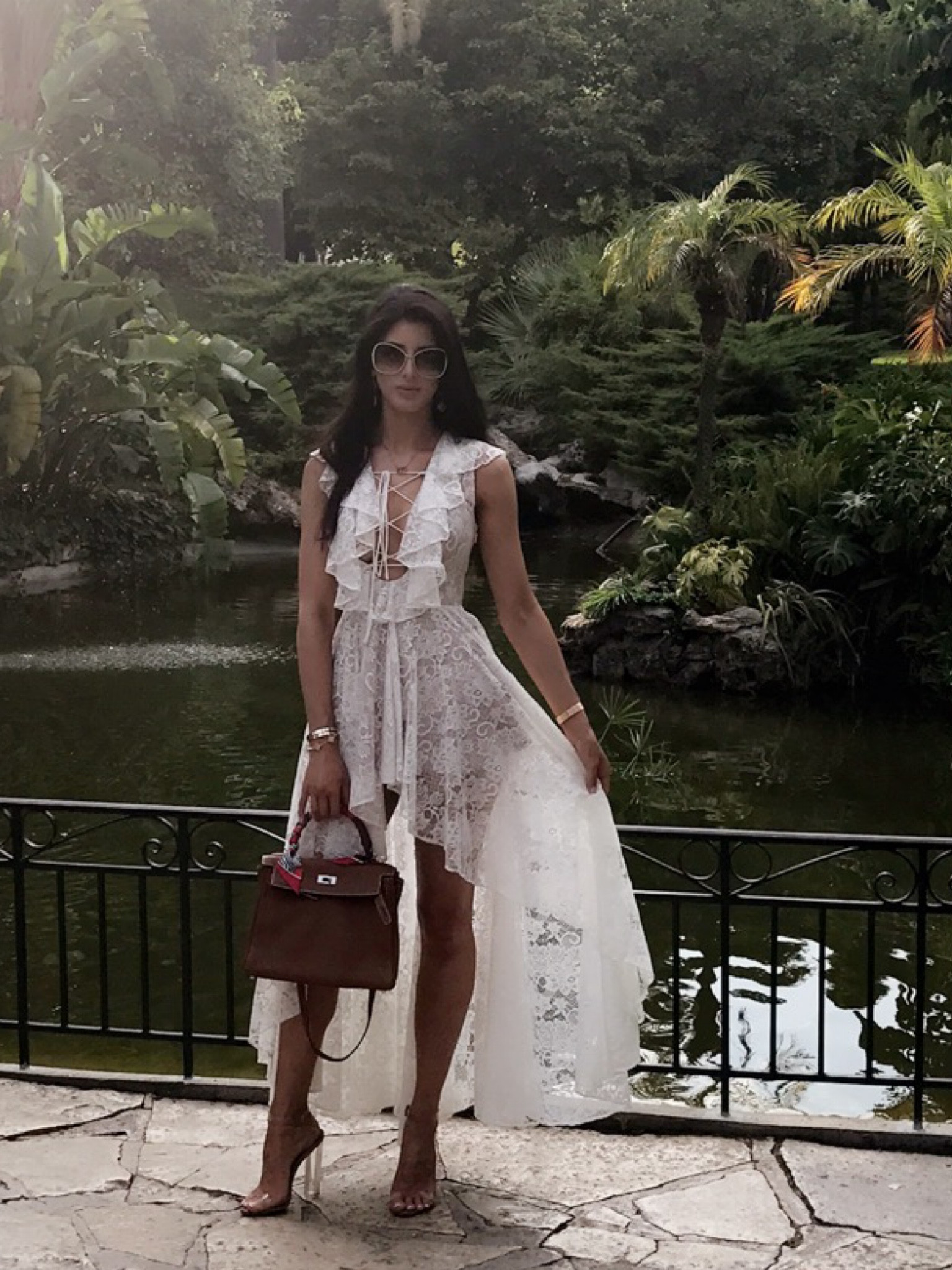 Get the Look. 

When in Monaco, wear your best. 

Really felt the vibes here and had to wear this gorgeous lace hi low dress by Jetset Diaries, paired with the Yeezy transparent heels and my Hermes Kelly in Gold. 

Linked all similar items. 

#LTKtravel #LTKeurope #LTKstyletip