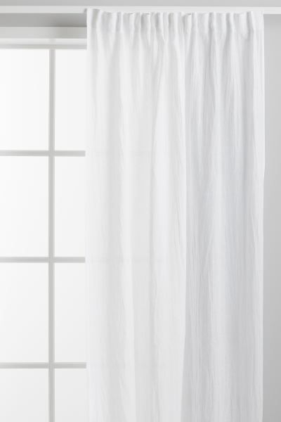 Premium SelectionTwo curtain panels in linen. Multiway header for four different hanging options:... | H&M (US + CA)