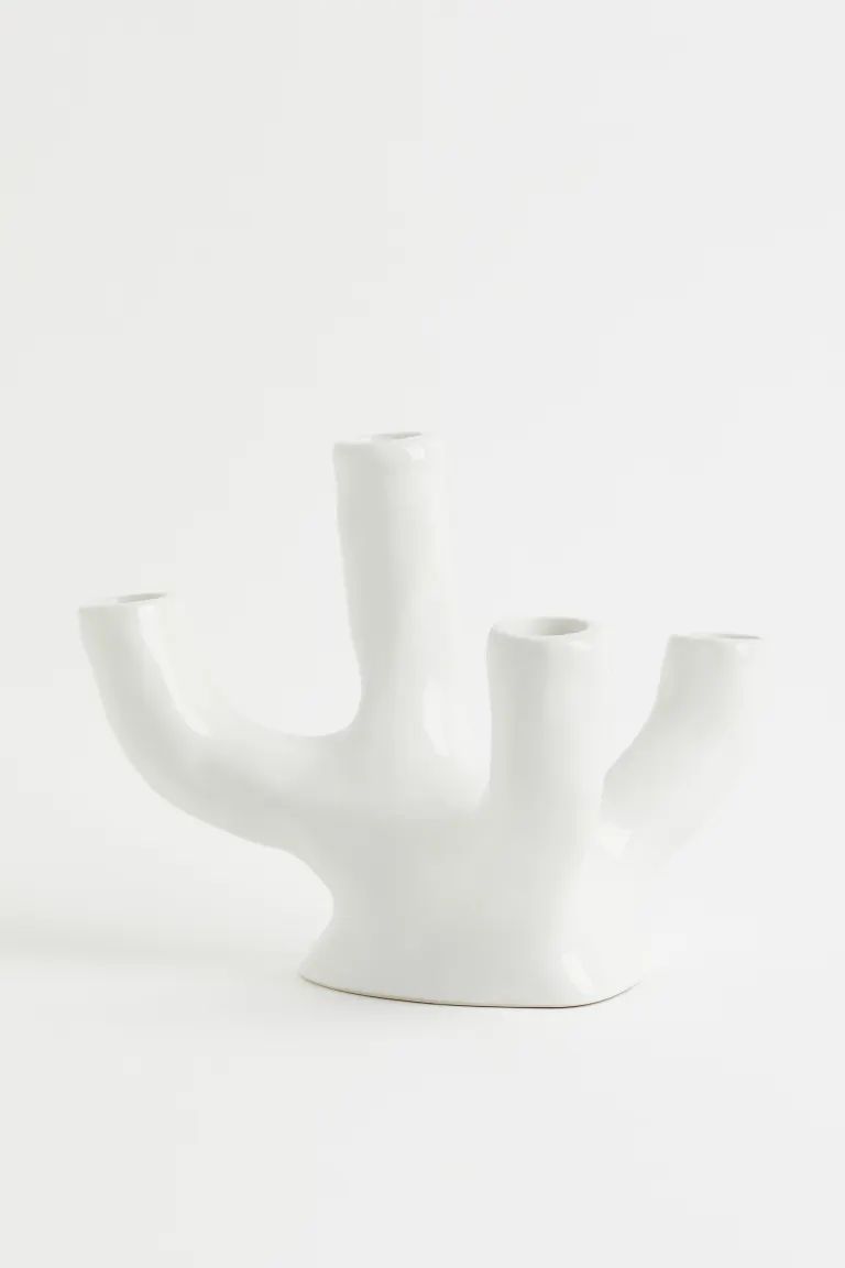Glazed stoneware candlestick with an irregular finish for a handmade look. Four arms with differe... | H&M (US + CA)