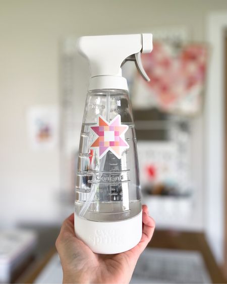 Love this solid glass spray bottle for pressing! 