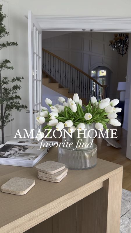 Prettiest glass vase from Amazon and most realistic faux tulips! 

#LTKGiftGuide #LTKVideo #LTKhome
