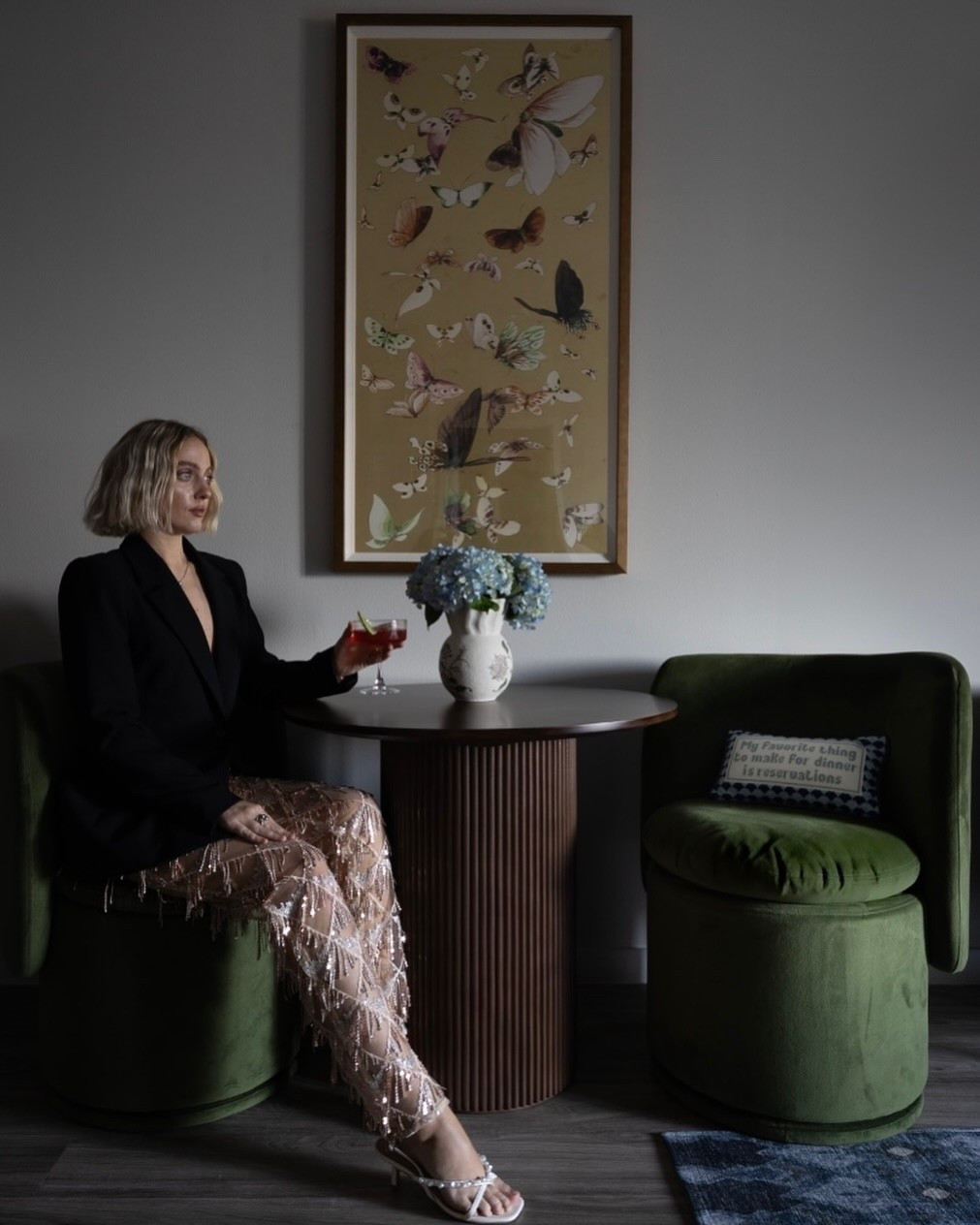 A moody little corner where rich textures, soft lighting, and a hint of drama create a moment suspended in time. Welcome to the dining nook at Midnight Botanica.
.
Art: @anthropologie 
Pillow & Vase: @anthropologie 
Table & Chairs: @wayfair 
.
Photographed by @stillhauscreative 
.
.
#diningtable #diningchair #diningnook #moodyinteriors #austindesign