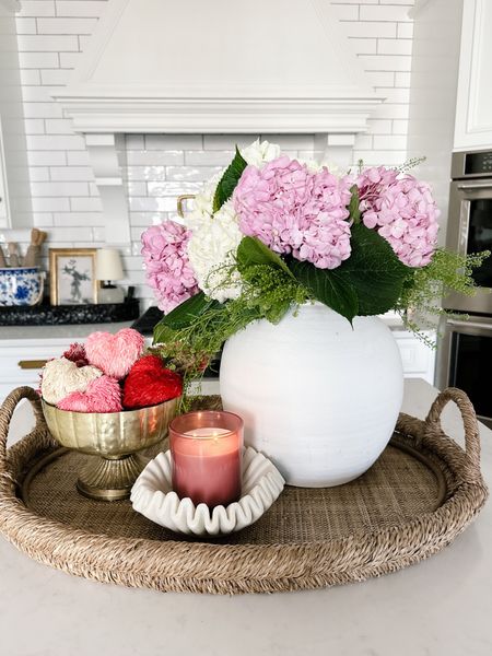 Home decor / valentine centerpiece / tray decor / kitchen decor amazon / white vase / wicker tray / pink candle / gold bowl / marble dish / kitchen decor 



#LTKhome #LTKSeasonal #LTKunder50