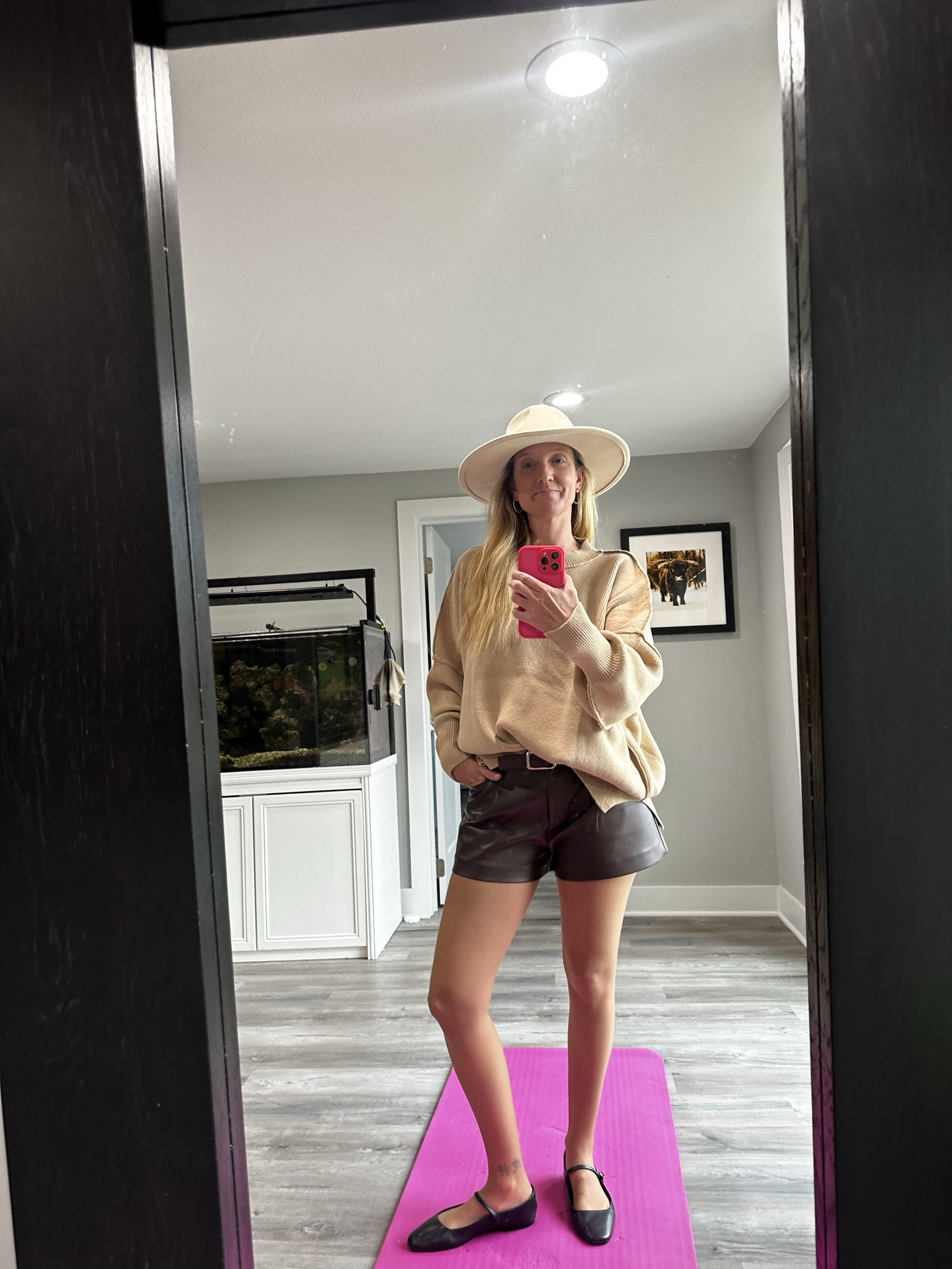 If you’re looking for a way to style your leather shorts for cooler weather, this is it! 🧶☕️ I love playing with proportions—an oversized sweater balances out the shorter hemline perfectly. I’ve finished the look with my go-to Mary Janes for a touch of classic charm. Everything is linked on my LTK page! 🛍️✨

Oversized tan sweater, camel knit pullover, faux leather shorts, brown leather shorts, wide brim felt hat, ivory fedora, Mary Jane flats, neutral fall outfit, transitional style, chunky knit sweater, winter shorts outfit, street style aesthetic, monochrome neutrals, textured fashion look, cozy chic, autumn layers

#LeatherShorts #OversizedSweater #FallStyle #NeutralOOTD #HatStyle #LTKstyletip #StreetStyleInspo #ChicFallFashion

#LTKOver40 #LTKU #LTKActive