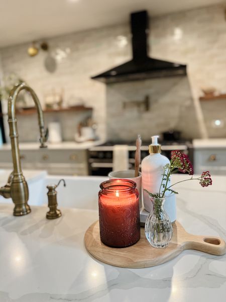 Elevate your kitchen sink with a catchall tray for your soap, dish sponge/brush, add a candle and some fresh flowers. Spark some joy while at the sink. #kitchenstyling #kitchendecor 

#LTKhome