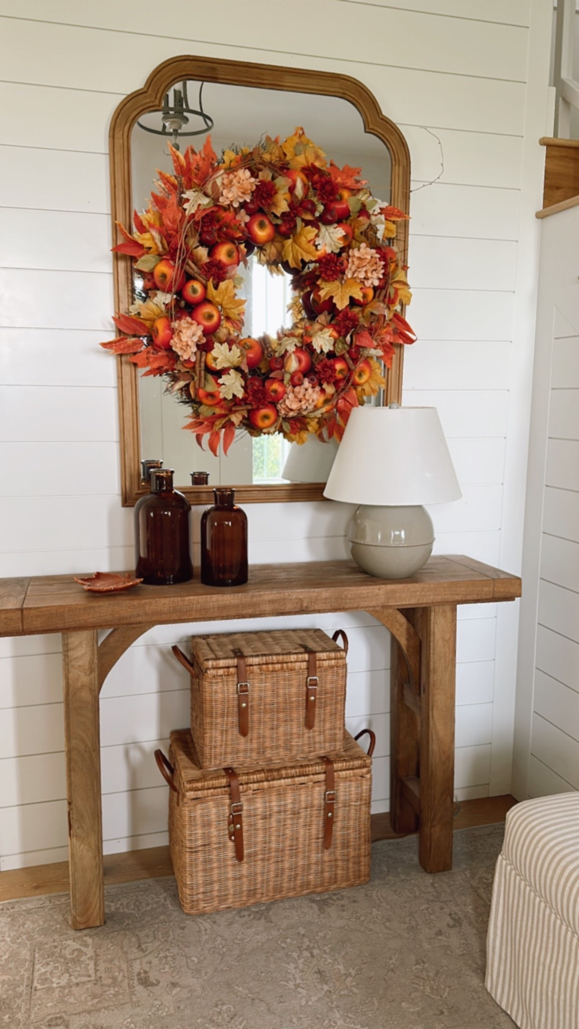 Reusing a few old things for my Fall entry. The wicker trunks are Magnolia, currently unavailable. The wreath is old from Balsam Hill but could be recreated with Hobby Lobby or Michael’s items! The amber bottles are Hobby lobby. Leaf plate, thrifted. 