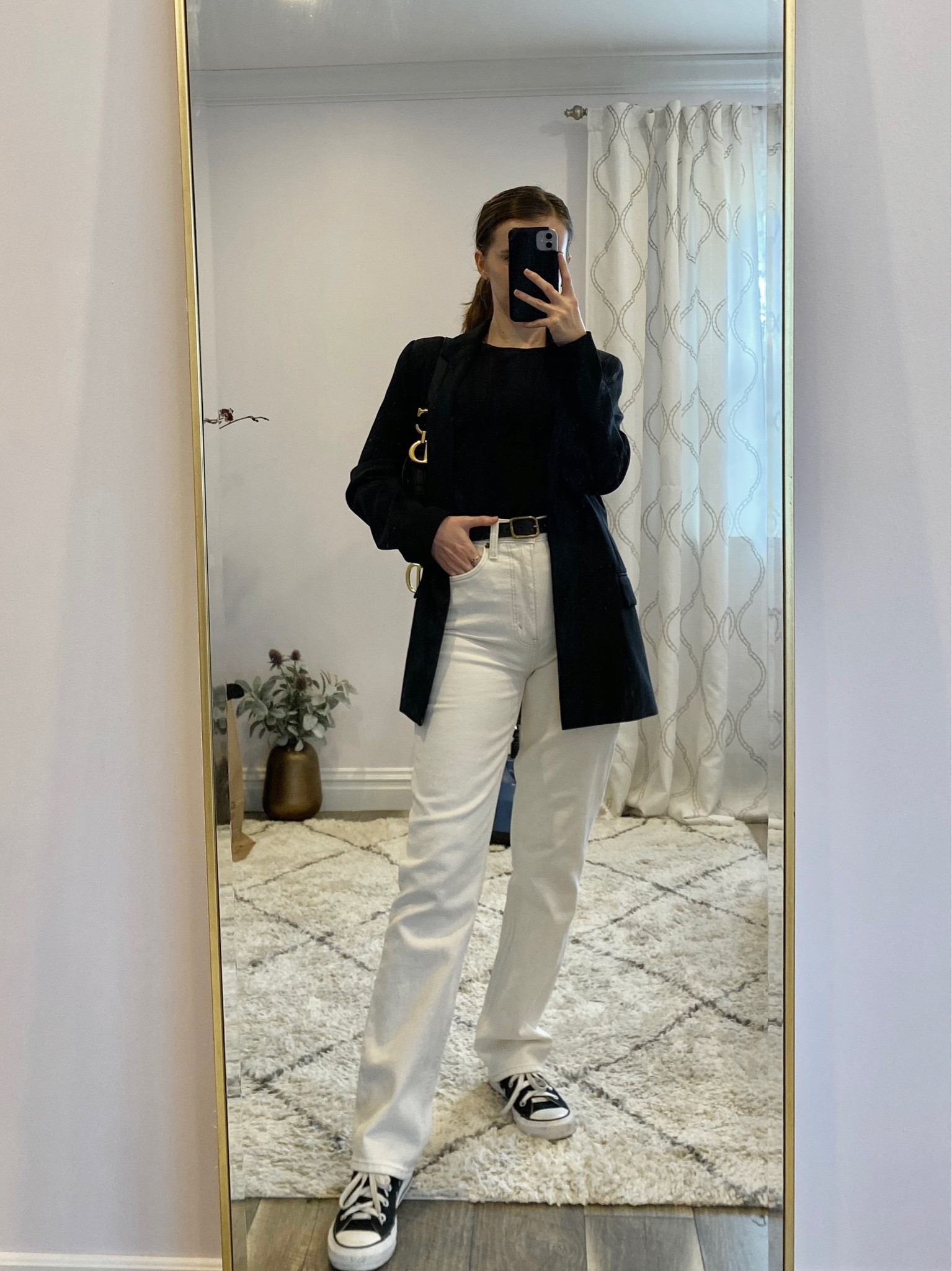 A black blazer paired with a bodysuit, white jeans, sneakers, and saddle bag makes a cute workwear or spring outfit  idea. 
.
.
.
.
.
#LTKSeasonal #LTKSale #LTKFind #LTKU #LTKitbags #LTKsalealert #LTKshoecrush #LTKstyletip #LTKunder50 #LTKunder100 #LTKworkwear 

Blazer outfit | blazer and jeans | Abercrombie blazer | black blazer outfit | oversized black blazer | double breasted blazer | casual outfits | casual work outfits | black bodysuit | bodysuit outfit | jeans outfit | jeans and sneakers | jeans and blazer | abercombie jeans | high waisted jeans | high rise jeans | white jeans outfit | straight jeans outfit | black converse | converse high tops | converse outfit | designer bags | outfit ideas | outfit inspo | spring outfits | spring fashion | 