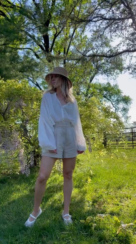 Neutral summer outfit, European vacation outfit idea, white blouse with linen shorts, mesh ballet flats, net shoes, straw bucket hat

#LTKTravel #LTKFindsUnder50 #LTKShoeCrush