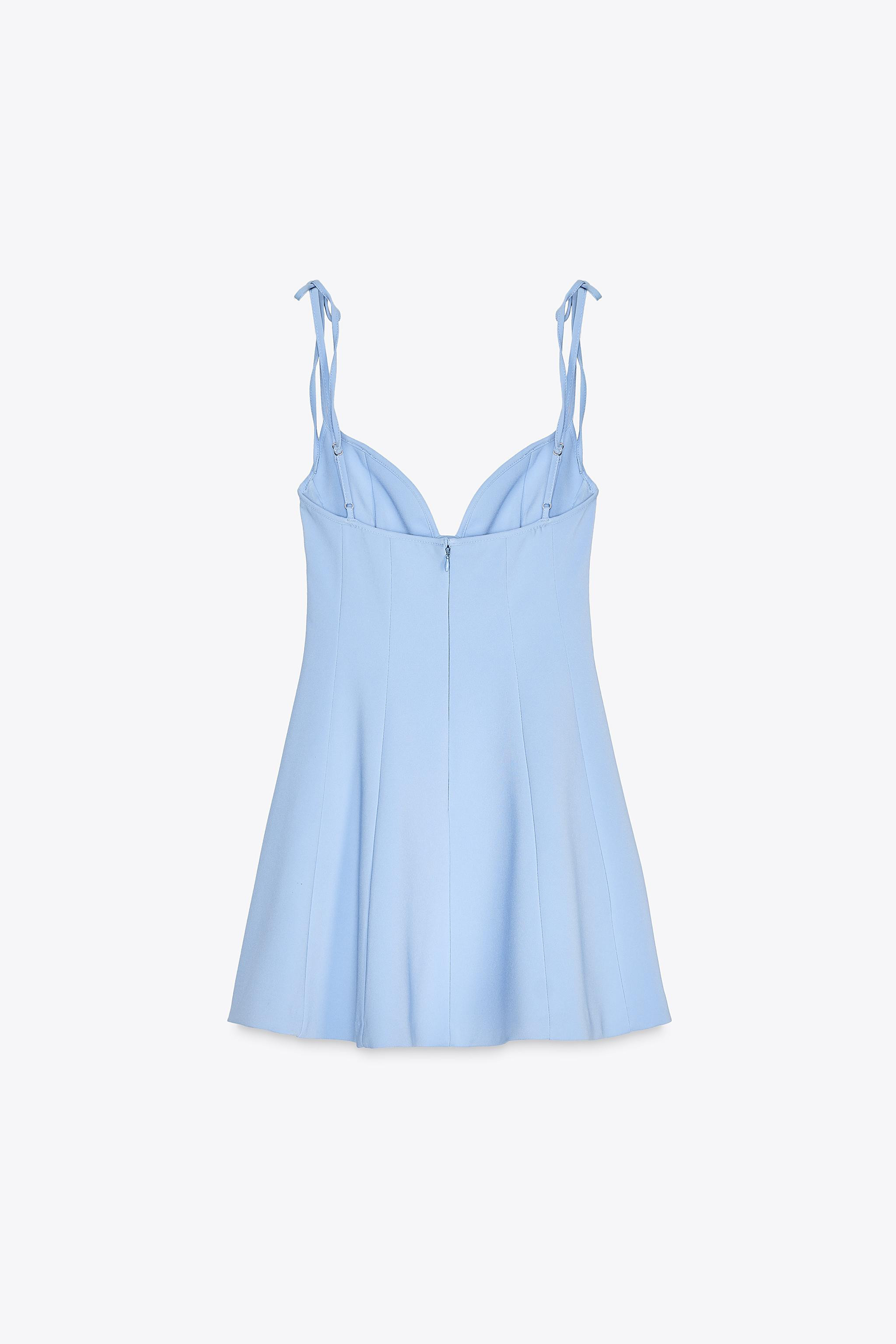Short dress made of stretch fabric. Sweetheart neckline and adjustable thin straps with tie detai... | Zara US