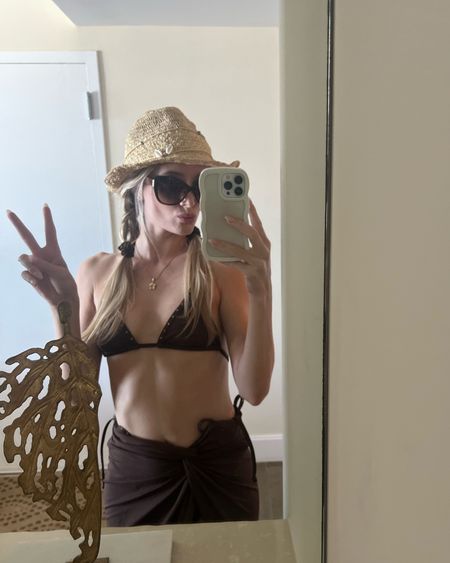 Brown bathing suit 

Brown bikini 
Brown bathing suit 
Skims 
Bachelorette 
Cult Gaia
Burberry sunglasses 
Straw hat
Florida 