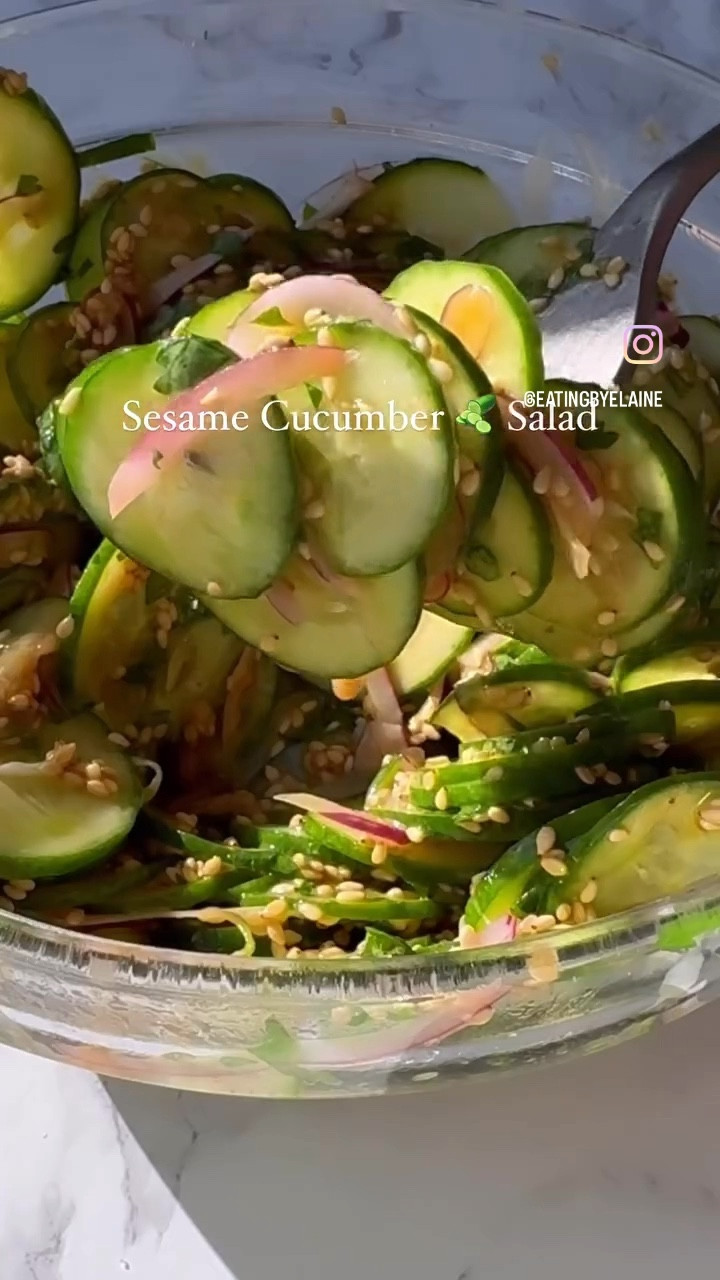 SESAME CUCUMBER SALAD 🥒 this one really has a hold on me currently 🤍 I’ve been making it daily and I have no plans to stop. Cucumbers are high in immune-boosting vitamin C and they have a high water content which makes this a refreshing and hydrating side dish this time of year. Plus, it’s just so flavorful. I can’t wait to hear what you all think of this one. 

INGREDIENTS:
3 Persian cucumbers, thinly sliced (use a mandolin for best results)
1/2 small red onion, thinly sliced (use a mandolin for best results)
3 tablespoons toasted sesame seeds
1 tablespoon good quality olive oil
1/2 teaspoon toasted sesame oil (or more to taste)
1/2 small lime, juiced
1/4 cup fresh cilantro, chopped
drizzle of runny tahini 
drizzle of date syrup
salt to taste (start with 1/4 teaspoon)

HOW TO: Add all ingredients to a small mixing bowl, toss and taste and adjust flavors as desired. 

Notes: I personally go heavy handed on the tahini and date syrup. The toasted sesame oil is strong so start with less - you can always add more if you want more sesame flavor. Make sure you buy toasted sesame oil and not regular sesame oil here. It is best if you use cucumbers that are already chilled here so you can serve immediately.

Don’t skip the tahini and date syrup drizzle at the end - it makes this recipe so unique

Below I’m linking my mandolin, my favorite tahini and favorite date syrup. These three items make a huge difference in the results of this recipe.

#cucumbersalad #cucumbers #sesamecucumbersalad #cucumberrecipes #easysalad #plantbasedrecipes #saladrecipe