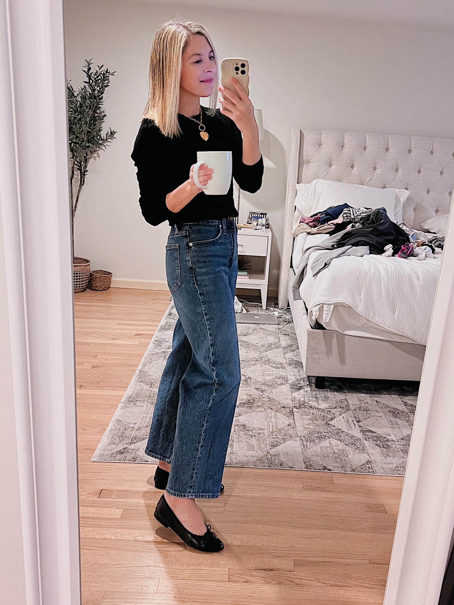 I reach for these jeans daily at this point. I’ve worn them with heels, ballet flats and sneakers! I’m 5’2” and wearing a 25 regular. 

The top is old Banana Republic and I bought these Chanel flats on Poshmark!