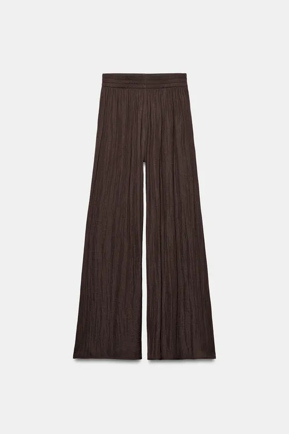Model height: 180 cmHigh-waist trousers with an elastic waistband and front pockets. Featuring a ... | Zara UK