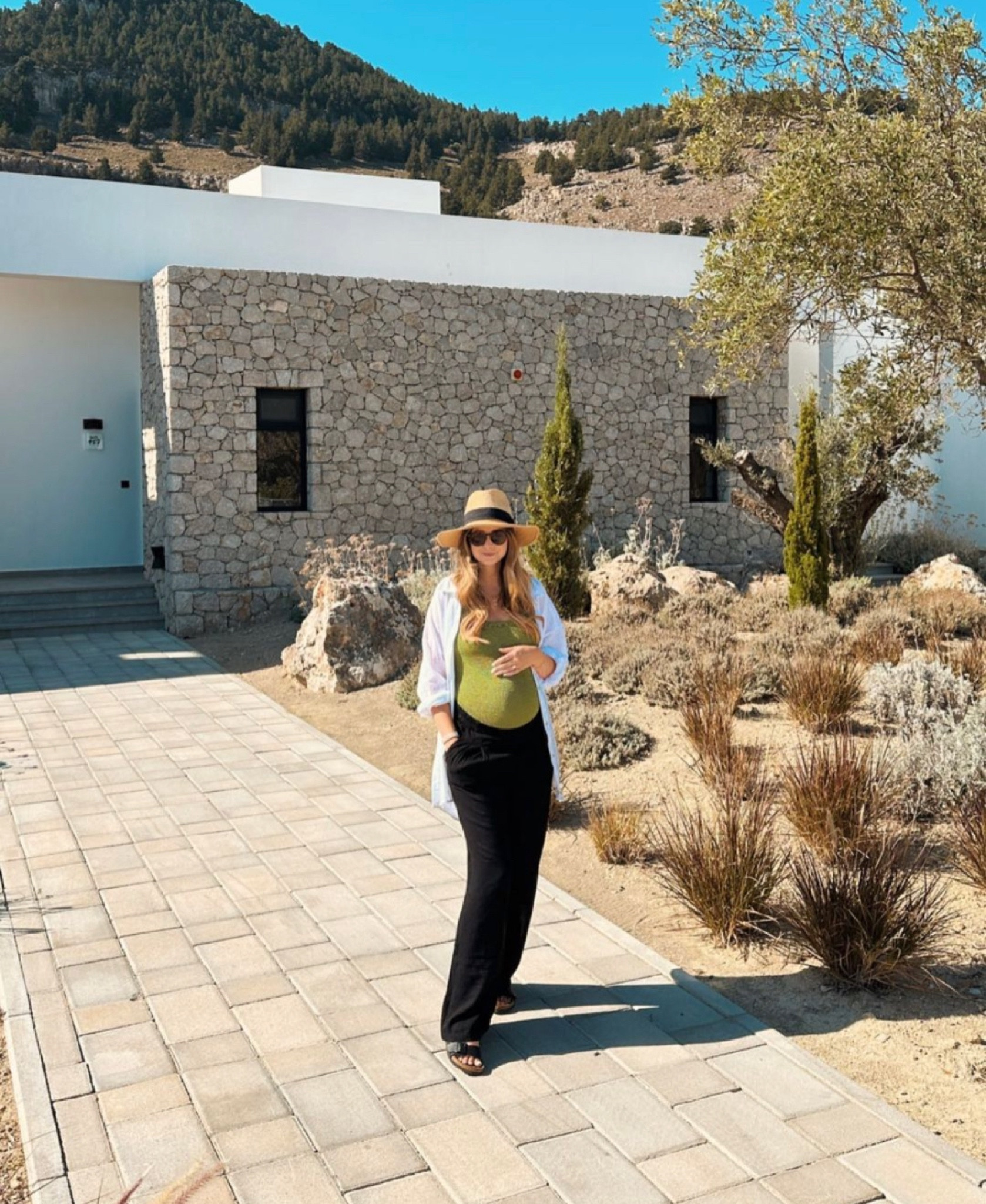 Beach hat, white shirt, green swimming costume, black trousers, black sandals #LTKHoliday 

#LTKSeasonal #LTKeurope
