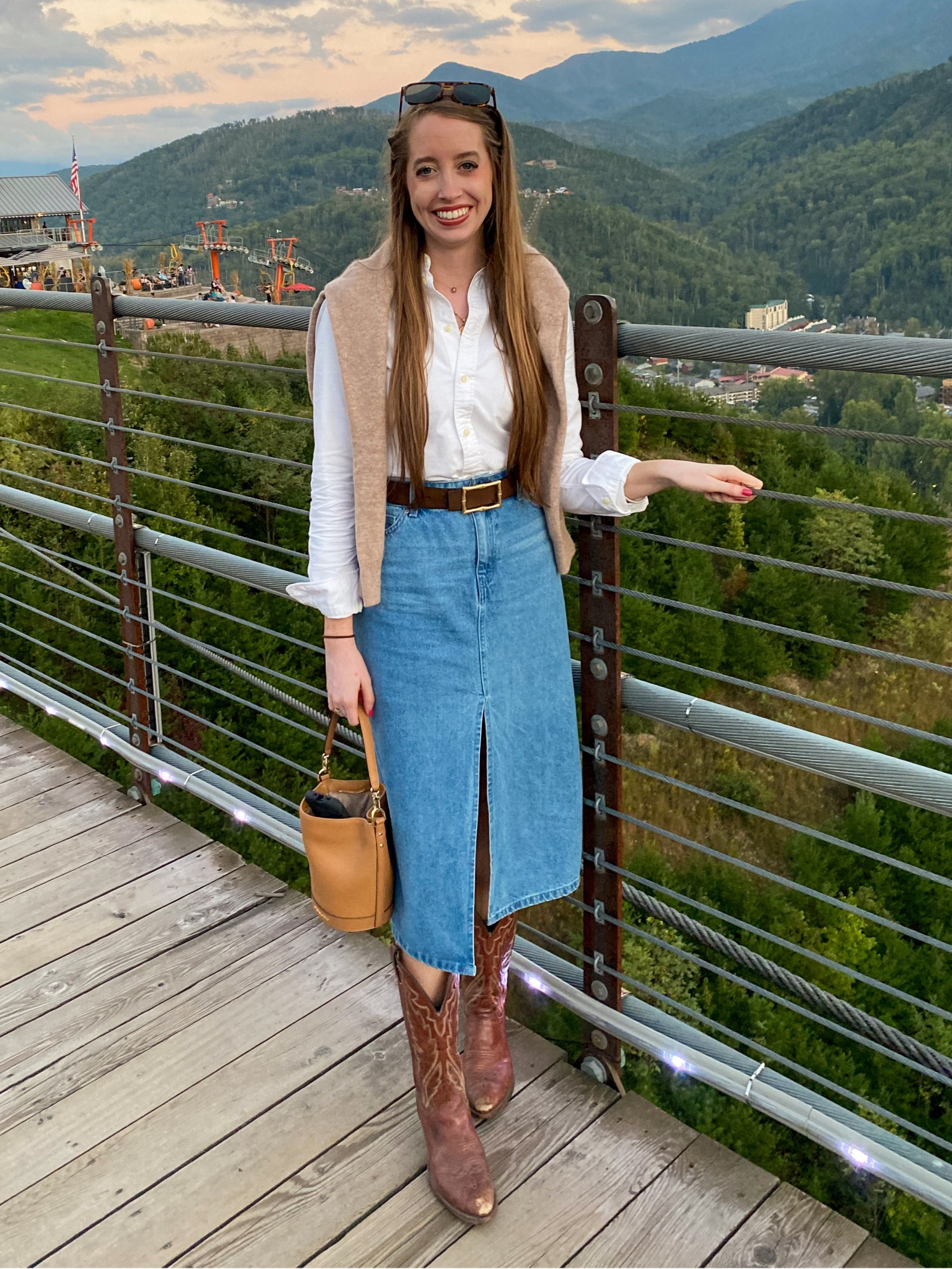 Fall cowboy boots outfit - denim midi skirt outfit - preppy outfit - bucket bag - cashmere sweater - fall outfit 

#LTKFindsUnder100 #LTKFindsUnder50 #LTKStyleTip