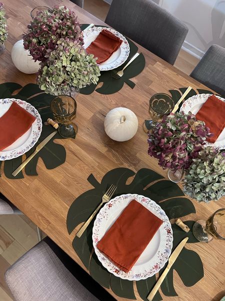 Simple and cozy tablescape to kick off the long weekend. 
I blended monstera shaped placemats with brick tone napkin, vintage Spode dishes and dried hydrangeas 


#LTKstyletip #LTKSeasonal #LTKhome